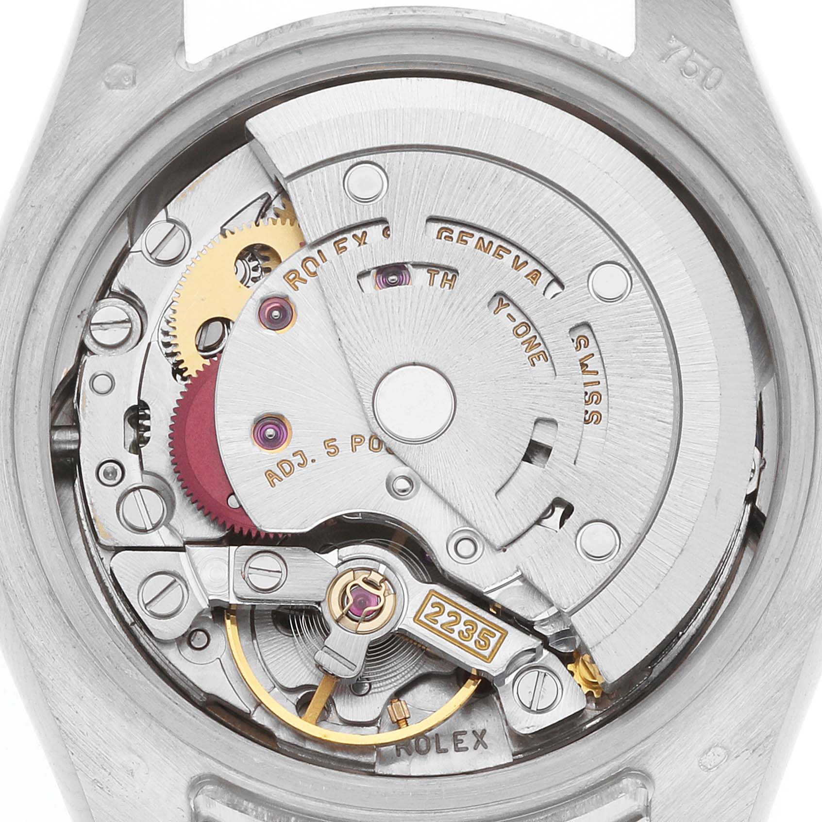 The image shows the movement of a Rolex President 179179 Women's White Gold Orange Dial model from a rear angle, highlighting the rotor, gears, and adjustments.