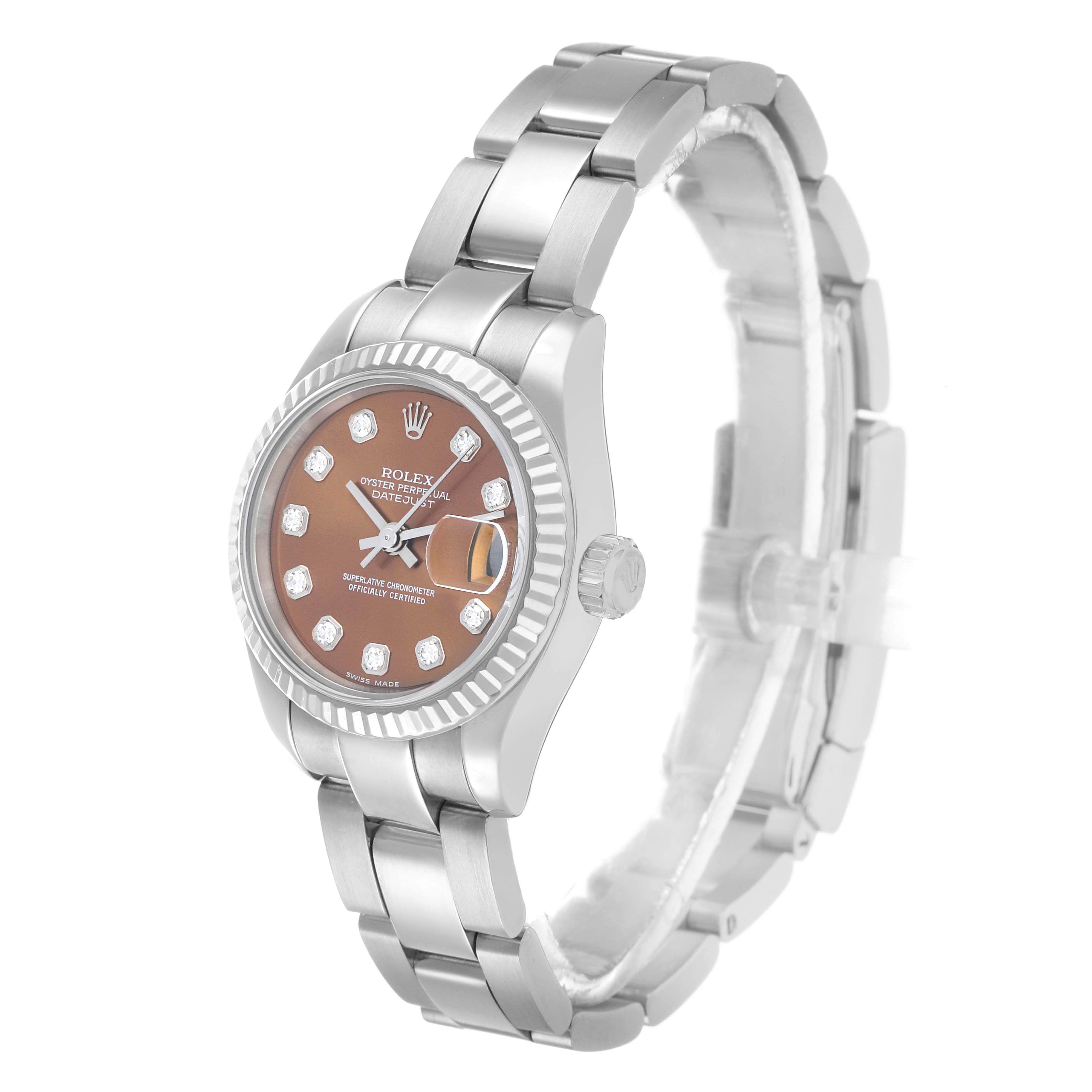 The Rolex President 179179 Women's White Gold Orange Dial model watch is shown at a three-quarter angle, highlighting the face, bezel, and bracelet.
