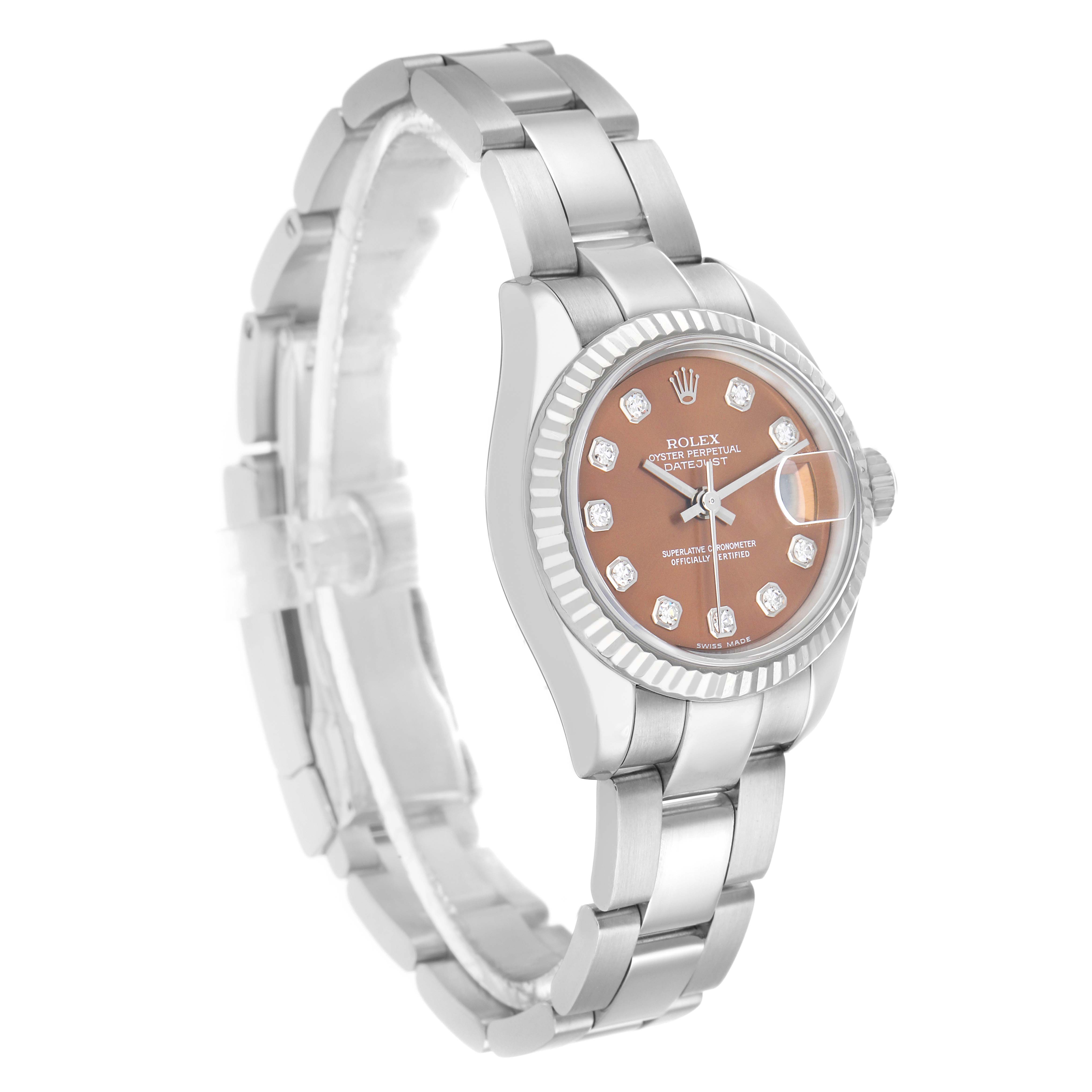 The Rolex President 179179 Women's White Gold Orange Dial model watch is shown at an angled view highlighting the bracelet, bezel, and diamond-accented dial.
