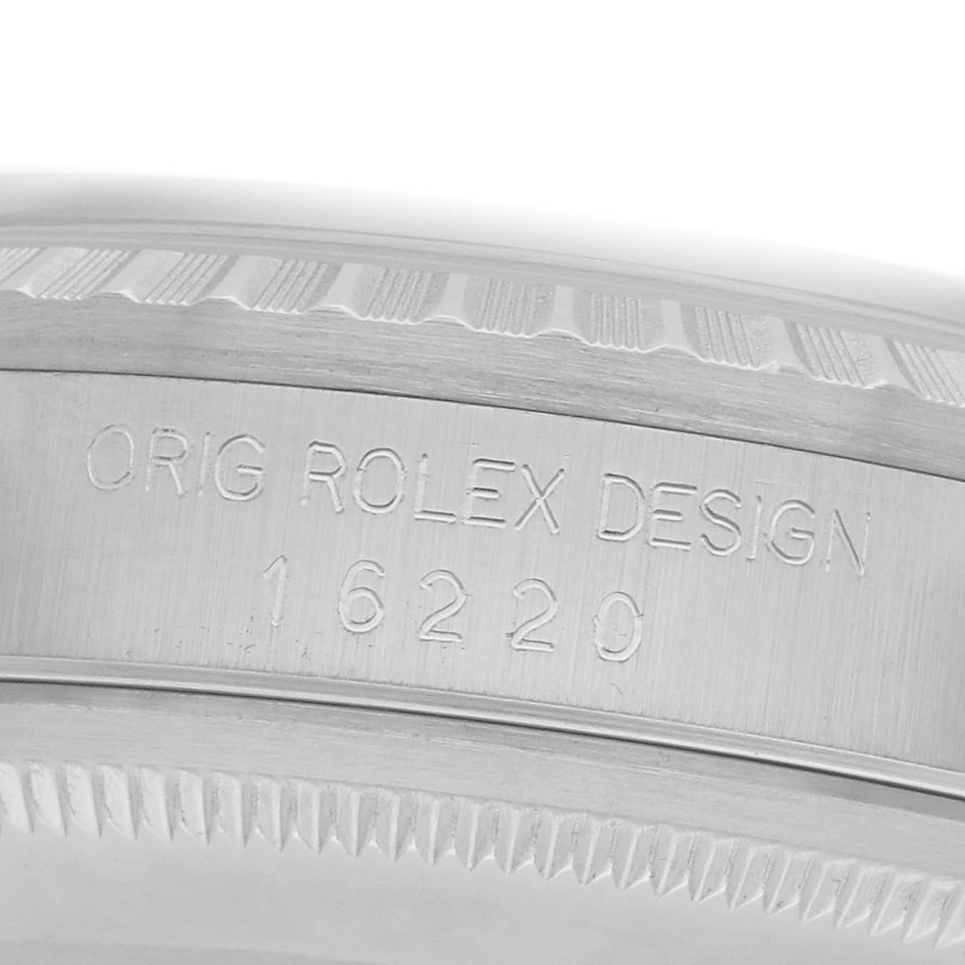 The image shows a close-up of the side of a Rolex Datejust 16220 Men's Stainless Steel Silver Dial, highlighting the model number 16220 and engraving on the case.