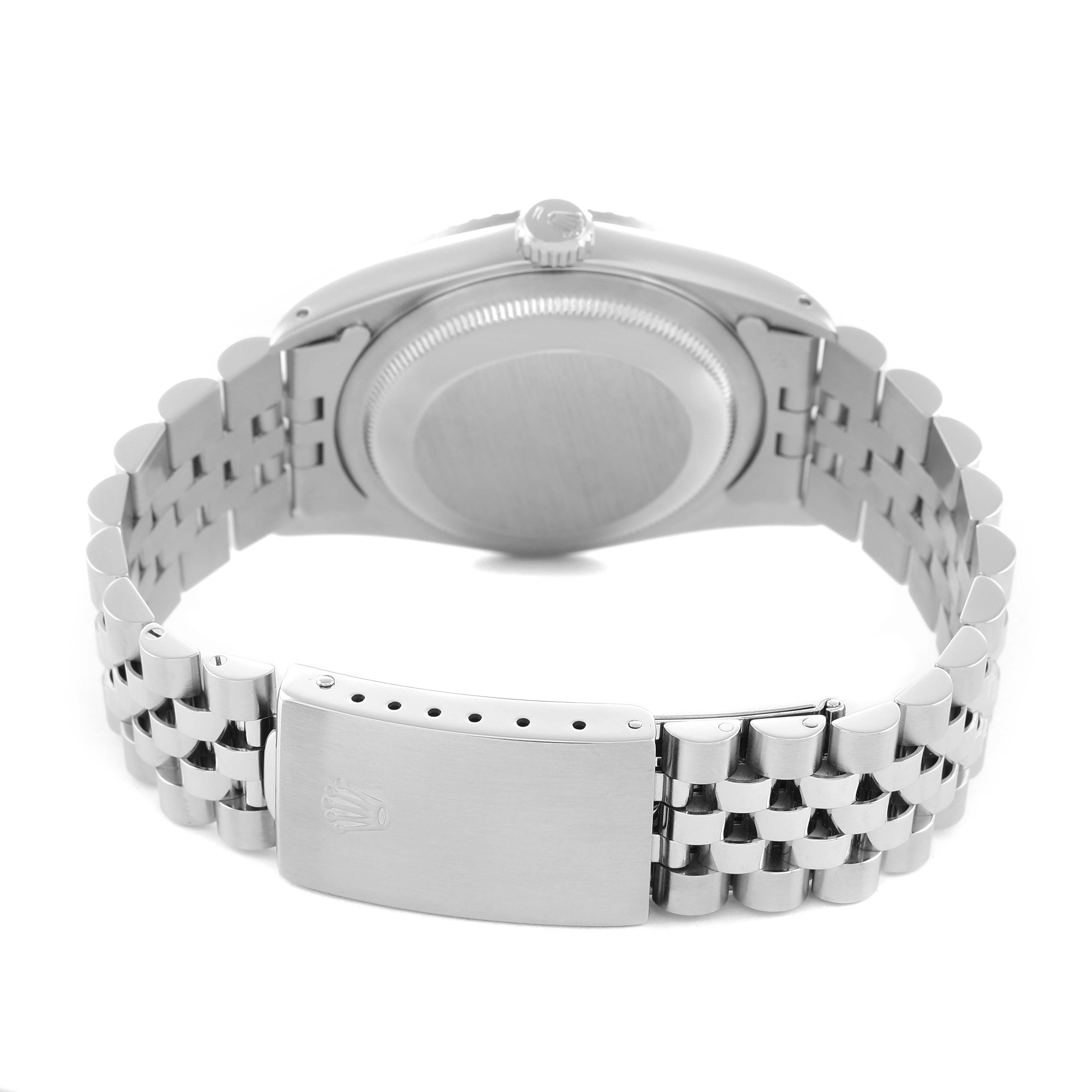 The image shows the Rolex Datejust 16220 Men's Stainless Steel Silver Dial from the back, highlighting the case, bracelet, and clasp.