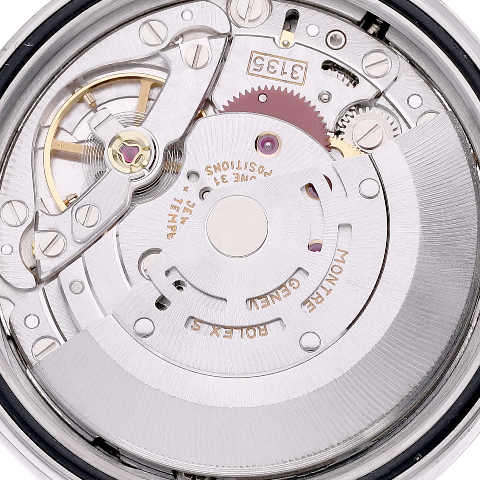 This close-up angle shows the inner mechanical movements of the Rolex Datejust 16233 Men's Steel and Gold (two tone) Champagne Dial 16233 Men's Steel and Gold (two tone) Champagne Dial watch model.