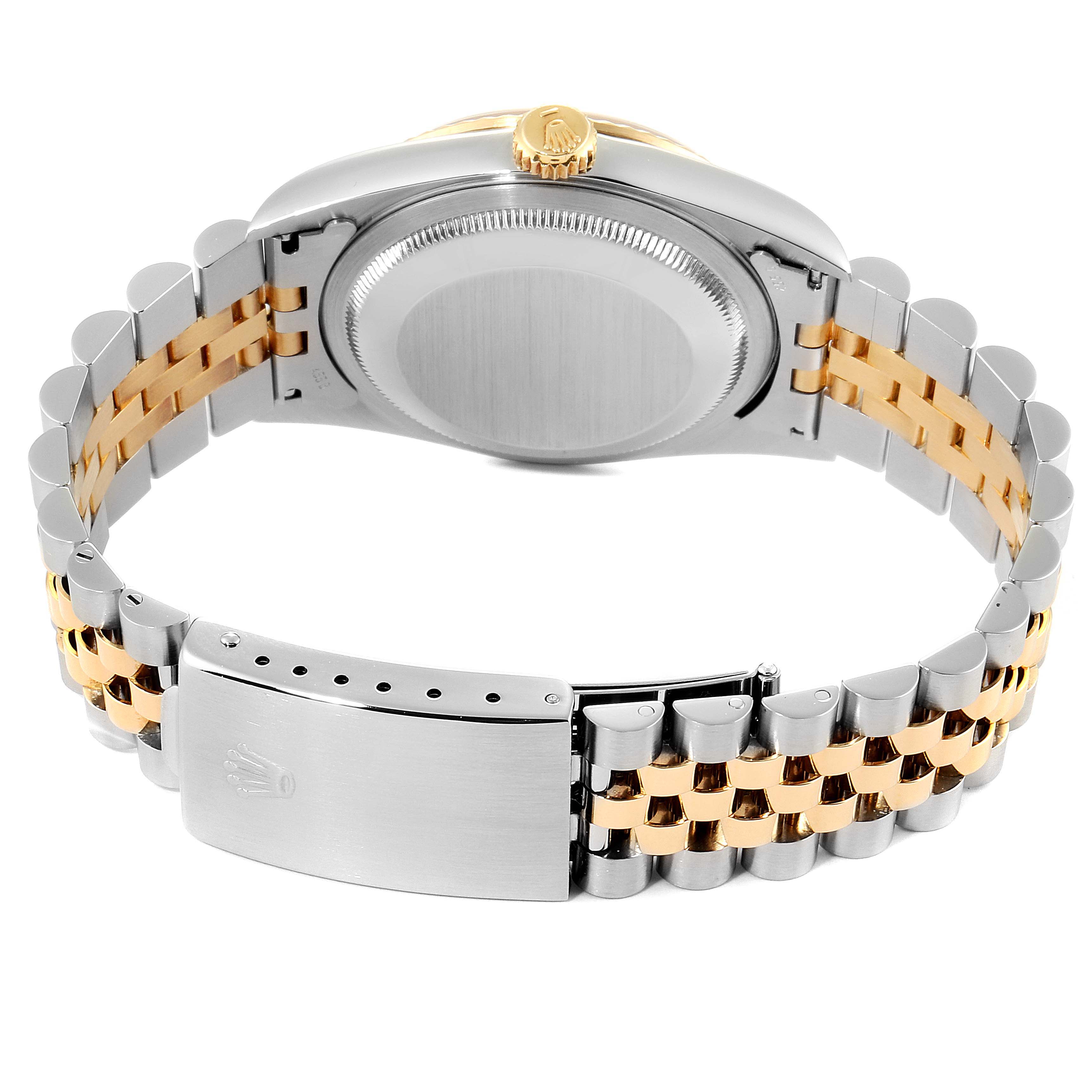 The image shows the back, clasp, and two-tone metal bracelet of a Rolex Datejust 16233 Men's Steel and Gold (two tone) Champagne Dial 16233 Men's Steel and Gold (two tone) Champagne Dial watch.