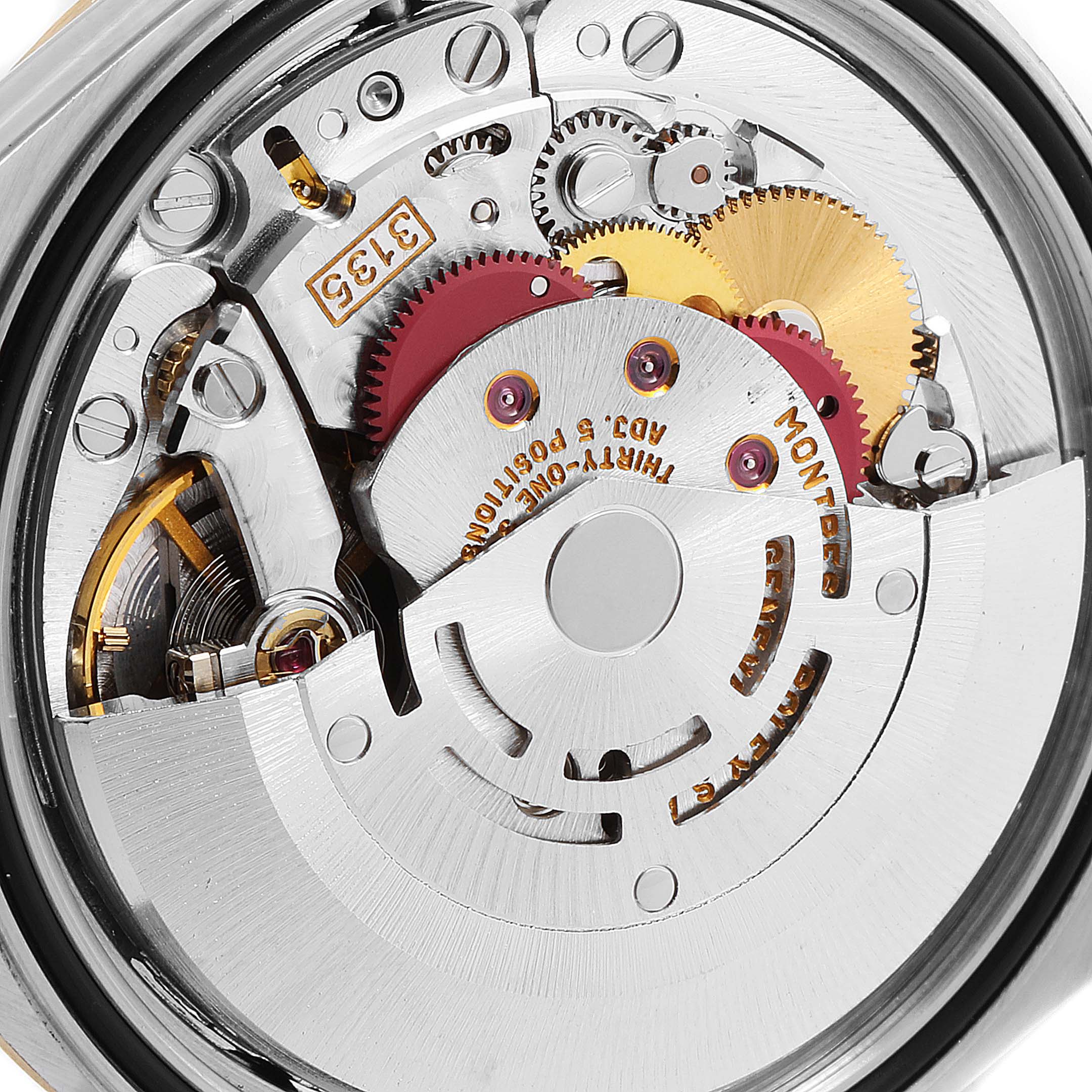 This image shows the internal mechanism of a Rolex Datejust 16233 Men's Steel and Gold (two tone) Champagne Dial 16233 Men's Steel and Gold (two tone) Champagne Dial model, highlighting the gears and movement parts from the back.