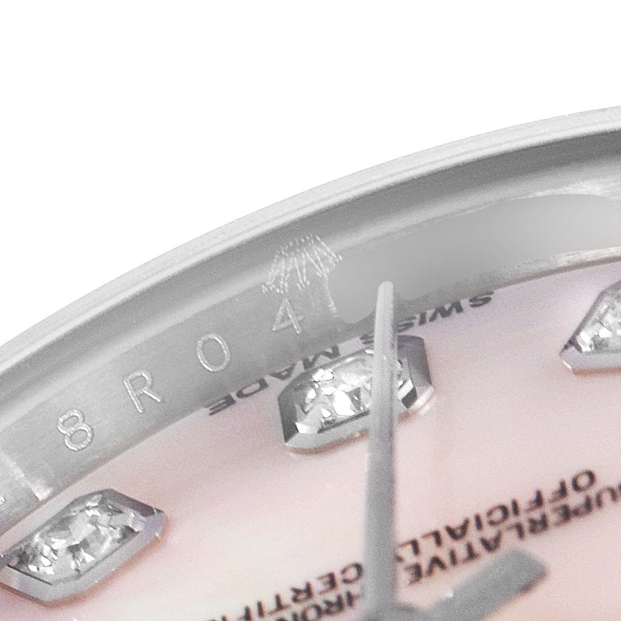 The image shows a close-up of the model number, part of the dial, and diamond markers on a Rolex Datejust 179174 Women's Stainless Steel Mother of Pearl Dial 179174 Women's Stainless Steel Mother of Pearl Dial watch.