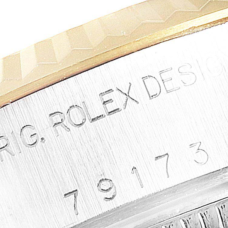 This close-up image shows the engraved model number and branding on the case side of a Rolex Datejust 79173 Women's Stainless Steel Silver Dial 79173 Women's Stainless Steel Silver Dial watch.
