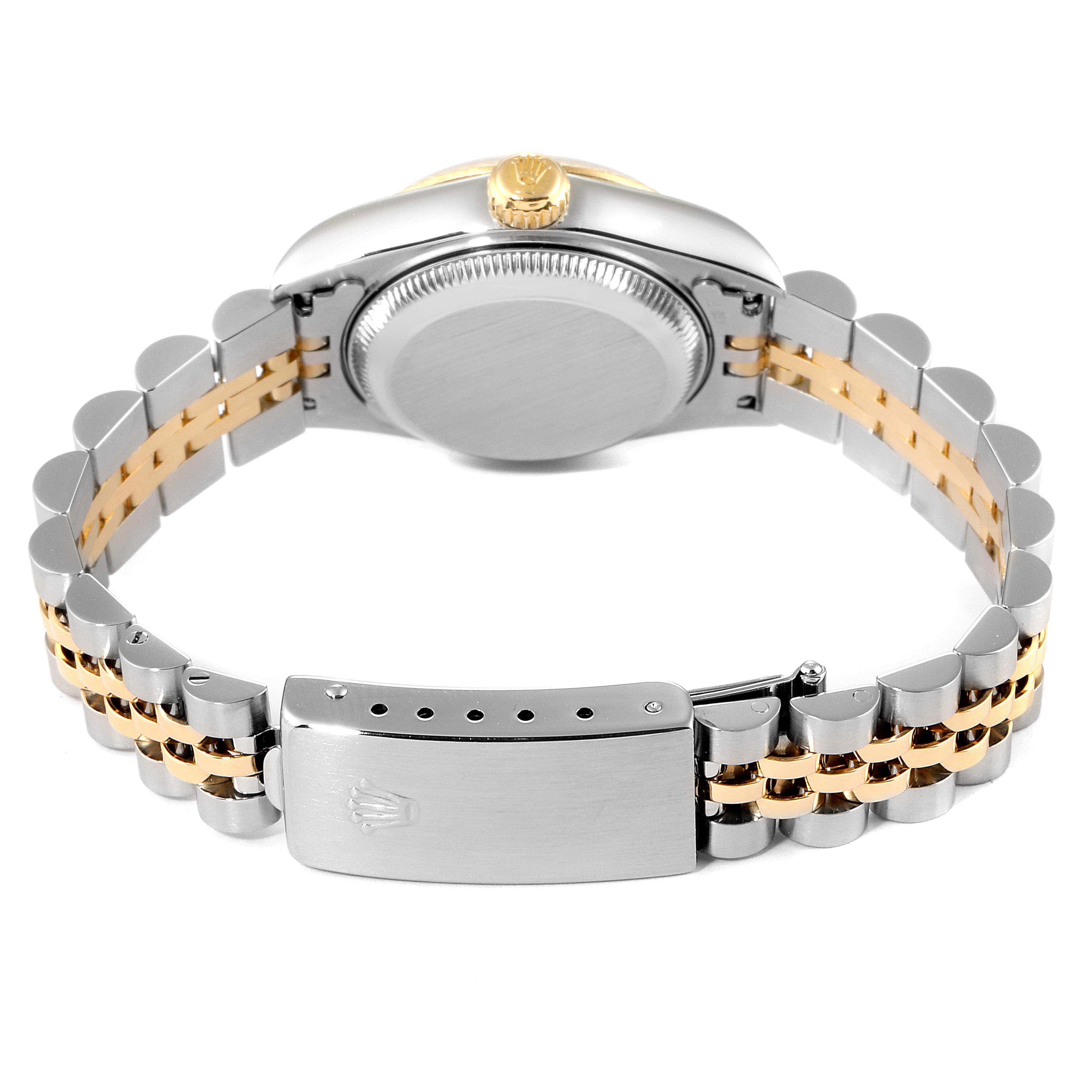 The image shows the back view of a Rolex Datejust 79173 Women's Stainless Steel Silver Dial 79173 Women's Stainless Steel Silver Dial watch, highlighting the case back, crown, and two-tone bracelet with a clasp.