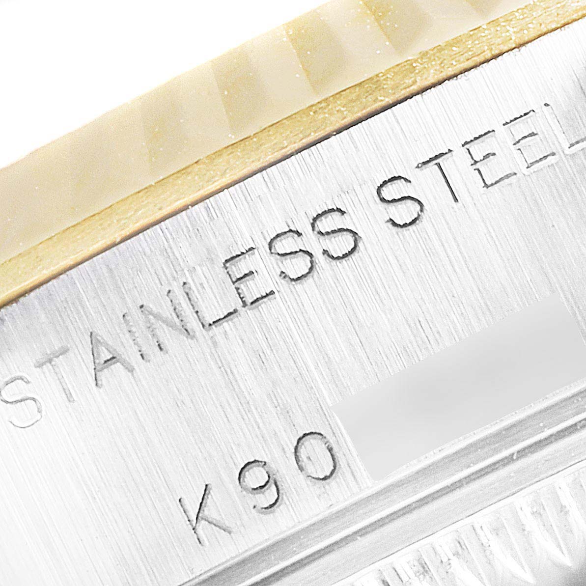 The image shows a close-up angle of the case side and bezel of a Rolex Datejust 79173 Women's Stainless Steel Silver Dial 79173 Women's Stainless Steel Silver Dial model, highlighting the "STAINLESS STEEL" engraving.