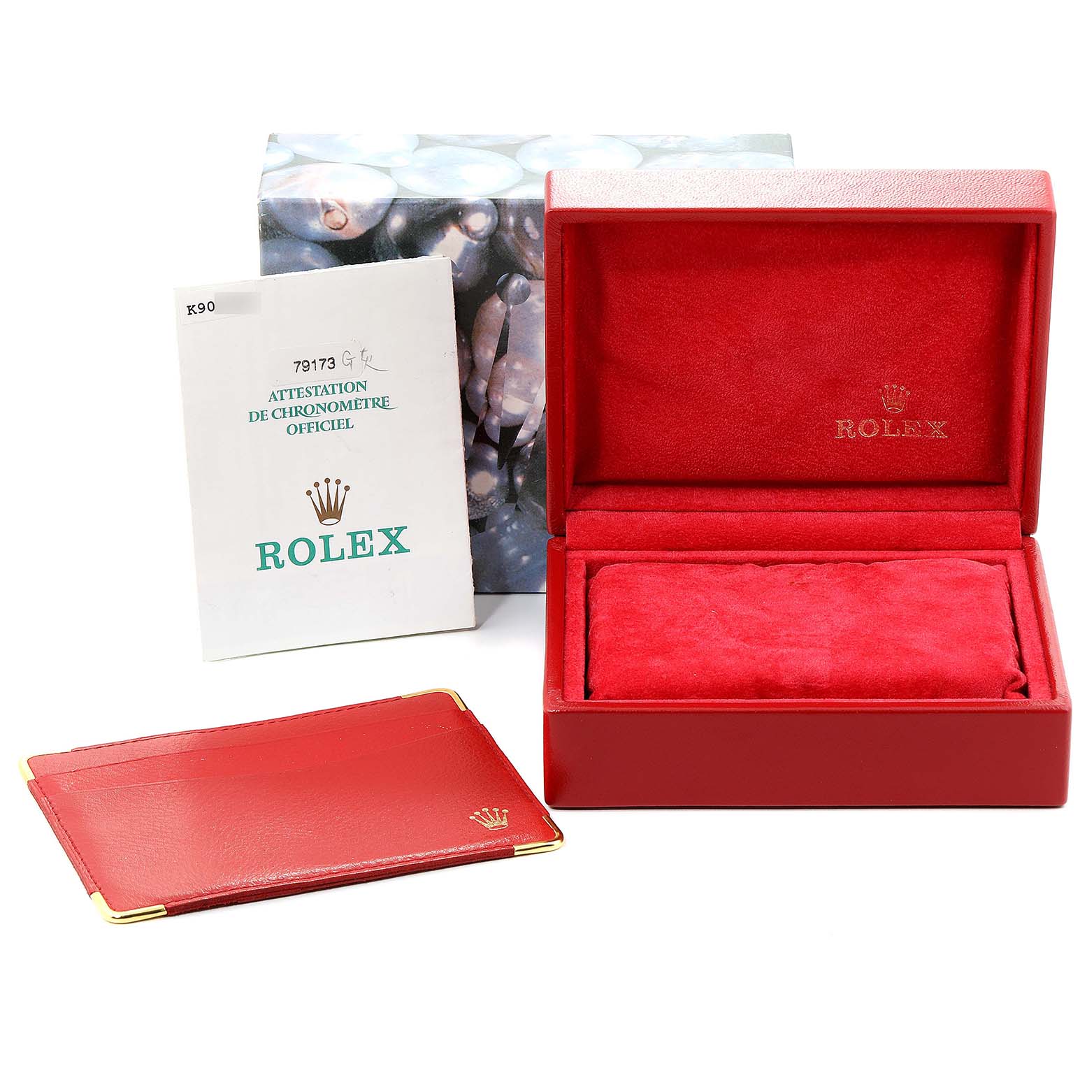 The image shows a red Rolex Datejust 79173 Women's Stainless Steel Silver Dial 79173 Women's Stainless Steel Silver Dial box, warranty card holder, official chronometer certificate, and outer box.