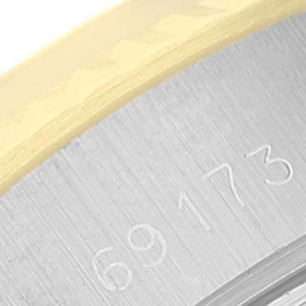 This close-up image shows the model number "69173" engraved on the case of a Rolex Datejust 69173 Women's Steel and Gold (two tone) Champagne Dial 69173 Women's Steel and Gold (two tone) Champagne Dial watch.