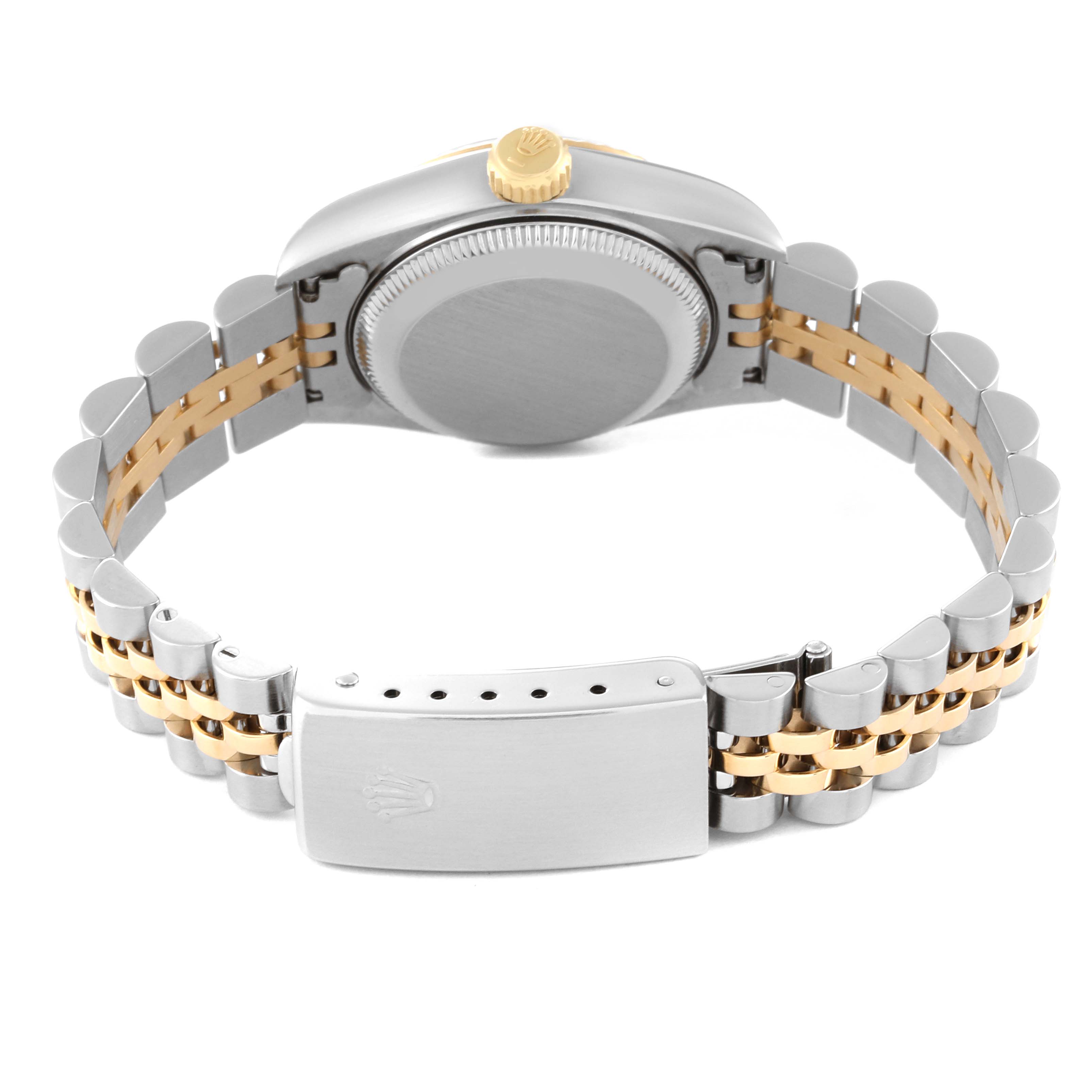 This image shows the back view of a Rolex Datejust 69173 Women's Steel and Gold (two tone) Champagne Dial 69173 Women's Steel and Gold (two tone) Champagne Dial watch, highlighting its case, crown, and two-tone bracelet with clasp.