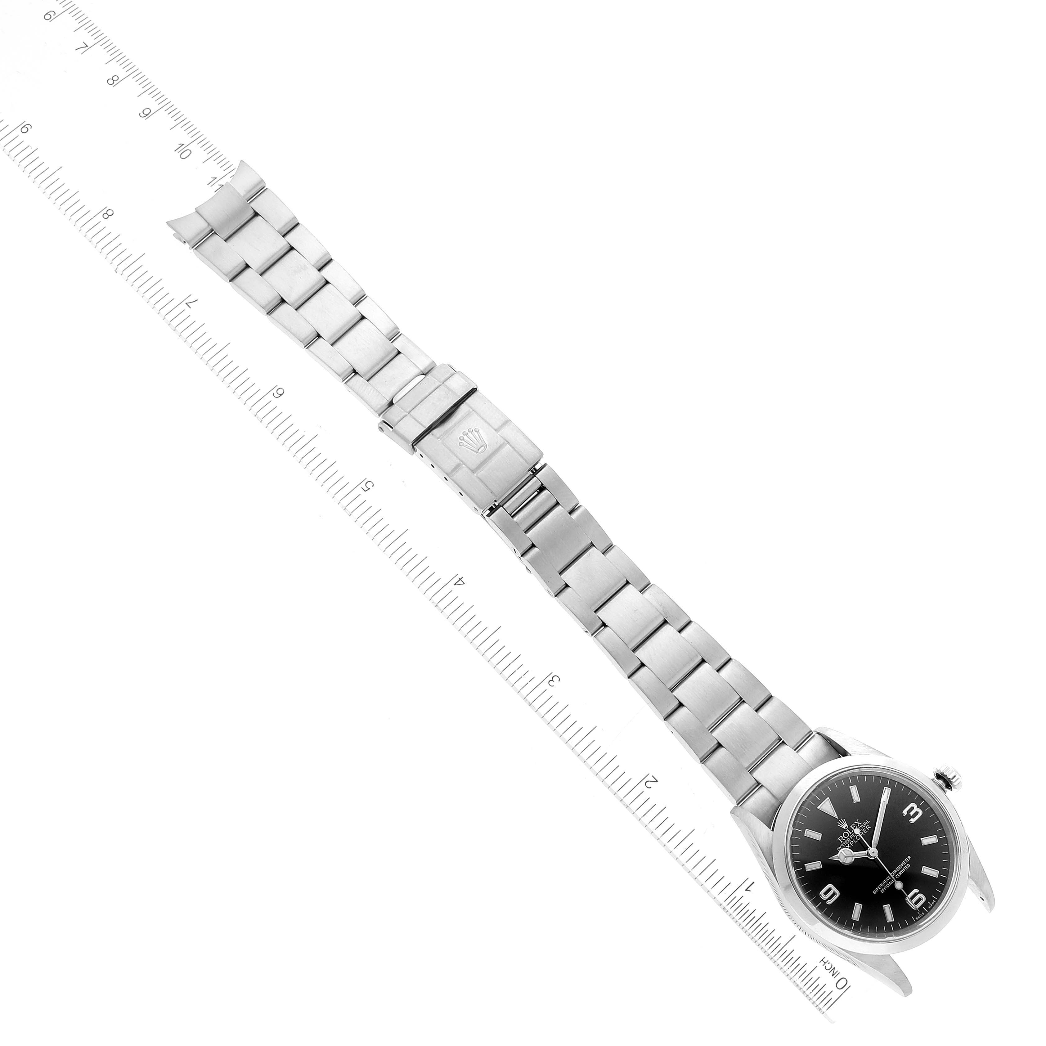 The image shows a Rolex Explorer 114270 Men's Stainless Steel Black Dial 114270 Men's Stainless Steel Black Dial watch laid flat, displaying the entire band and face from a top-down angle.