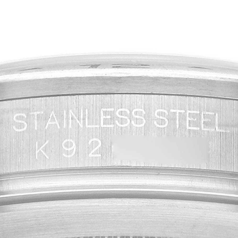 This image shows a close-up view of the stainless steel case back of a Rolex Explorer 16570 Men's Stainless Steel White Dial 16570 Men's Stainless Steel White Dial watch.