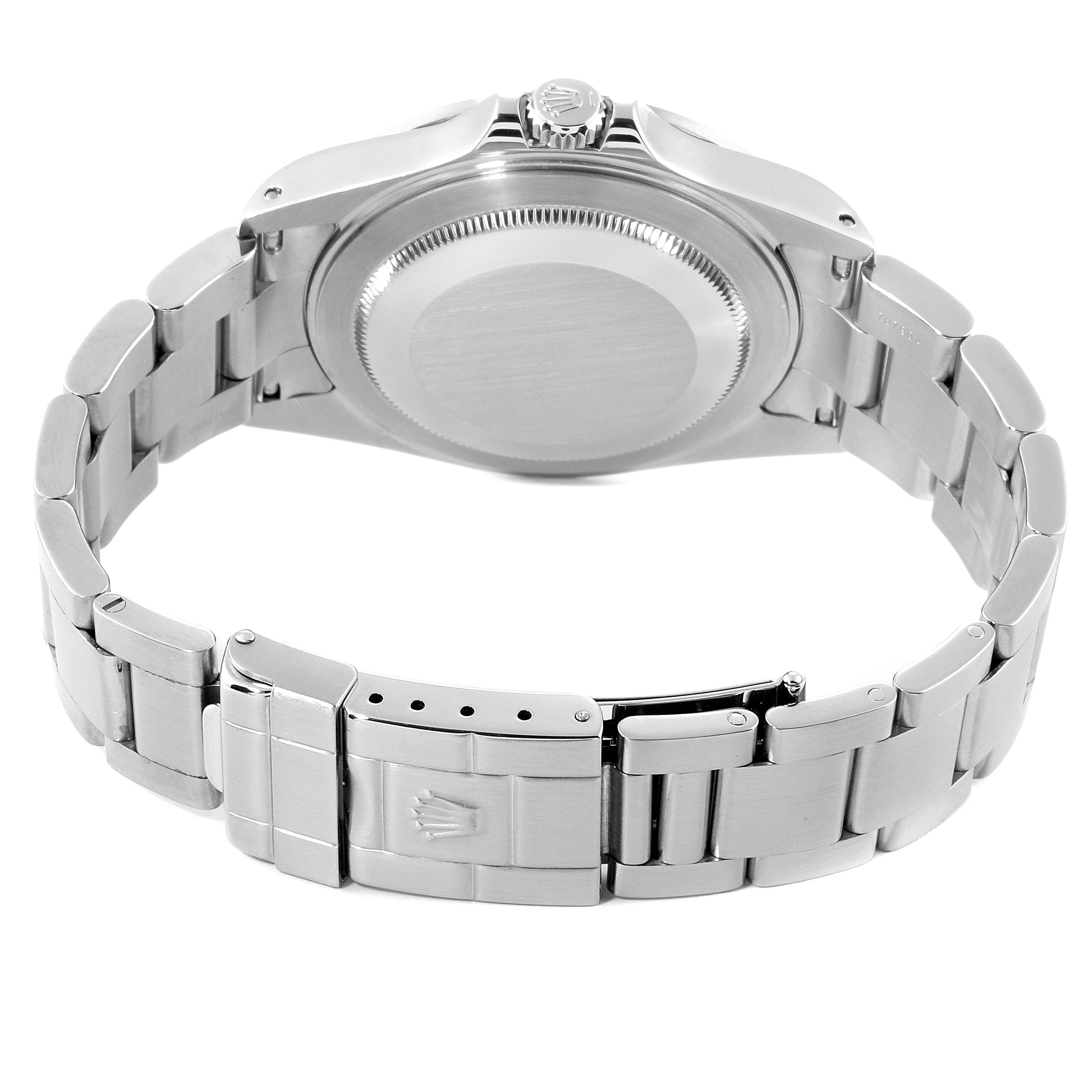 The image shows the back view of a Rolex Explorer 16570 Men
s Stainless Steel Black Dial 16570 Men
s Stainless Steel Black Dial watch, highlighting its case back, crown, and bracelet with the clasp.