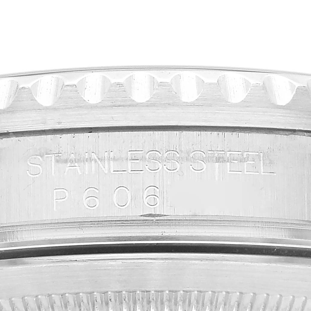 The image shows a close-up of the stainless steel caseback and the reference number of a Rolex GMT-Master 16710 Men's Stainless Steel Black Dial 16710 Men's Stainless Steel Black Dial watch.