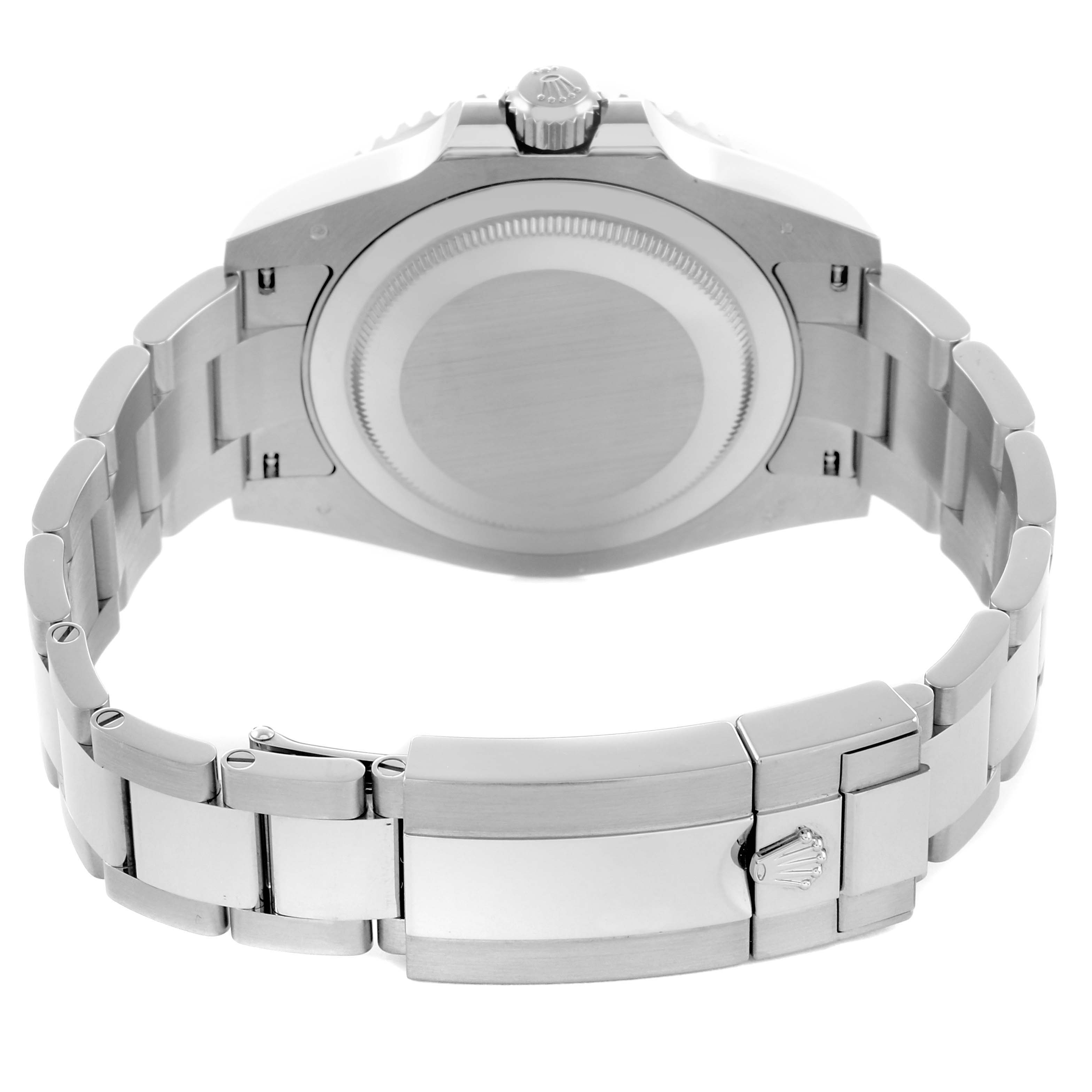 The Rolex GMT-Master 126729VTNR Men's White Gold Green Dial is shown from the back, highlighting the case back and bracelet clasp.