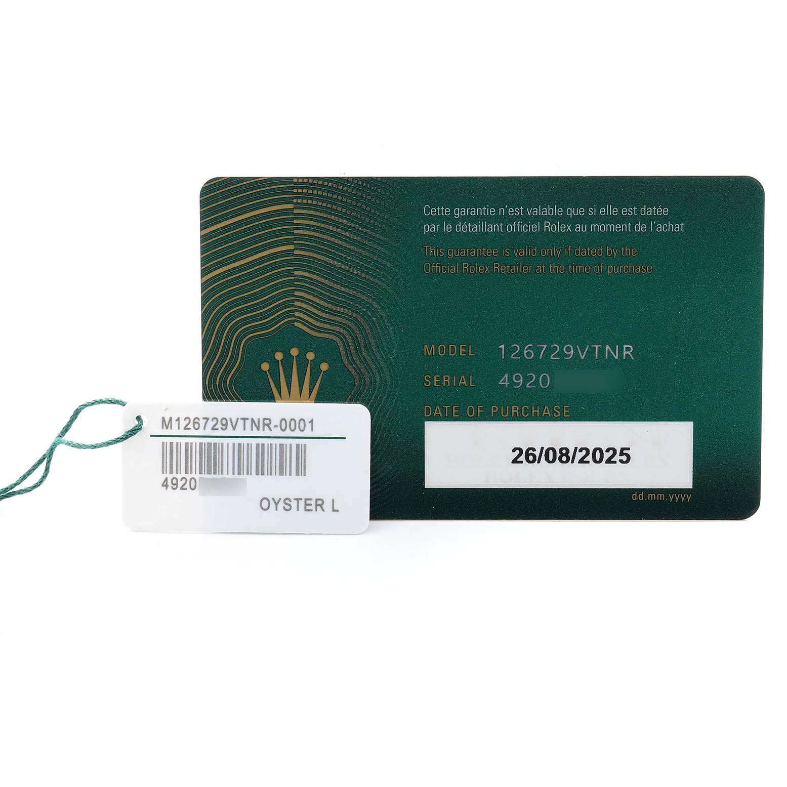 The image shows a Rolex GMT-Master 126729VTNR Men's White Gold Green Dial model warranty card and tag with model and serial numbers, and purchase date.
