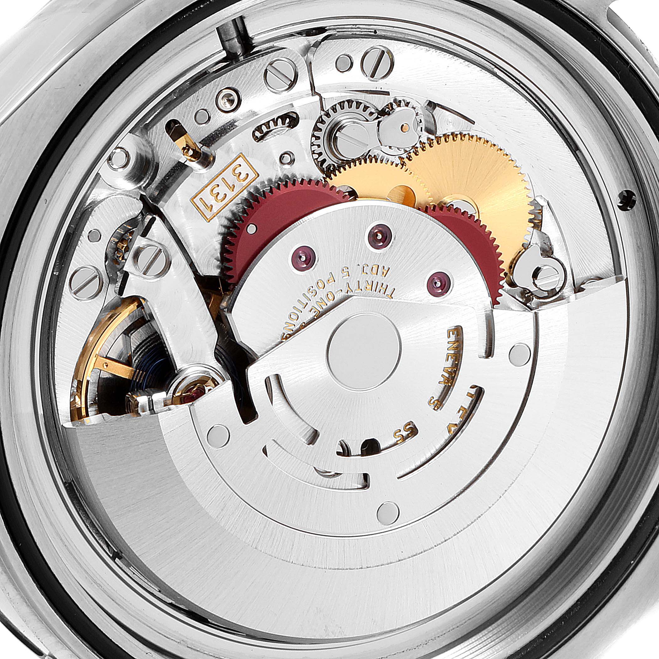 The image shows the detailed internal mechanism of a Rolex Milgauss 116400V Men's Stainless Steel Black Dial 116400V Men's Stainless Steel Black Dial watch from a top-down angle, emphasizing gears and components.