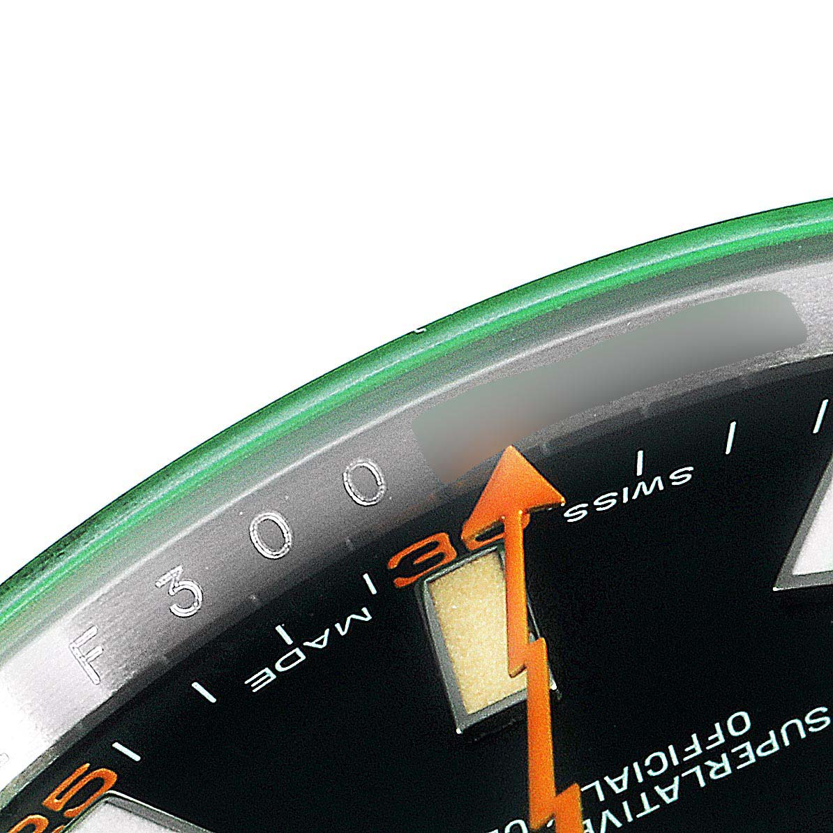 This is a close-up of the Rolex Milgauss 116400V Men's Stainless Steel Black Dial 116400V Men's Stainless Steel Black Dial watch, showing a portion of the black dial, green crystal edge, and orange lightning-bolt second hand.