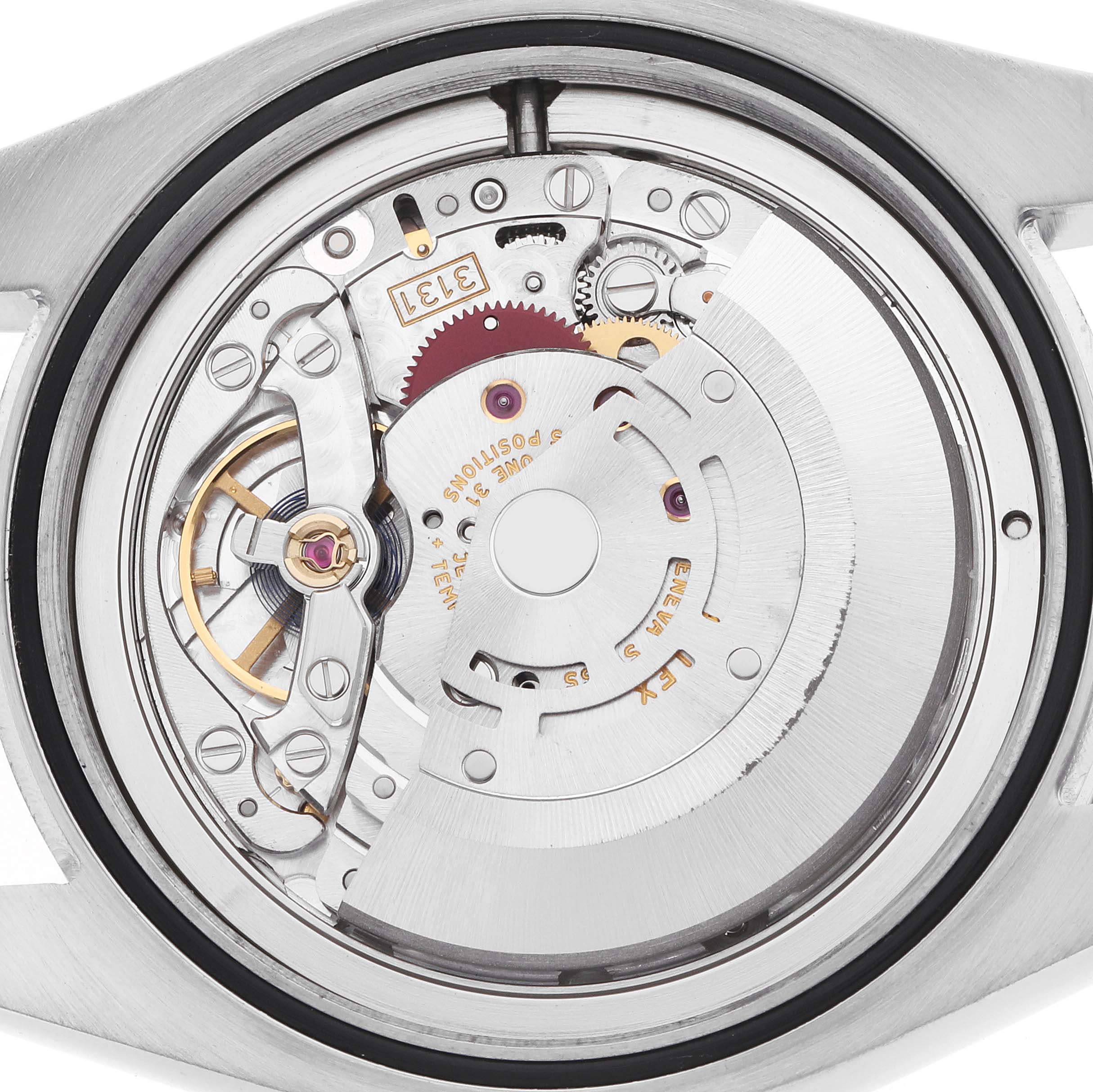 The image shows the back of a Rolex Milgauss 116400 Men's Stainless Steel White Dial watch, highlighting its intricate movement mechanism.