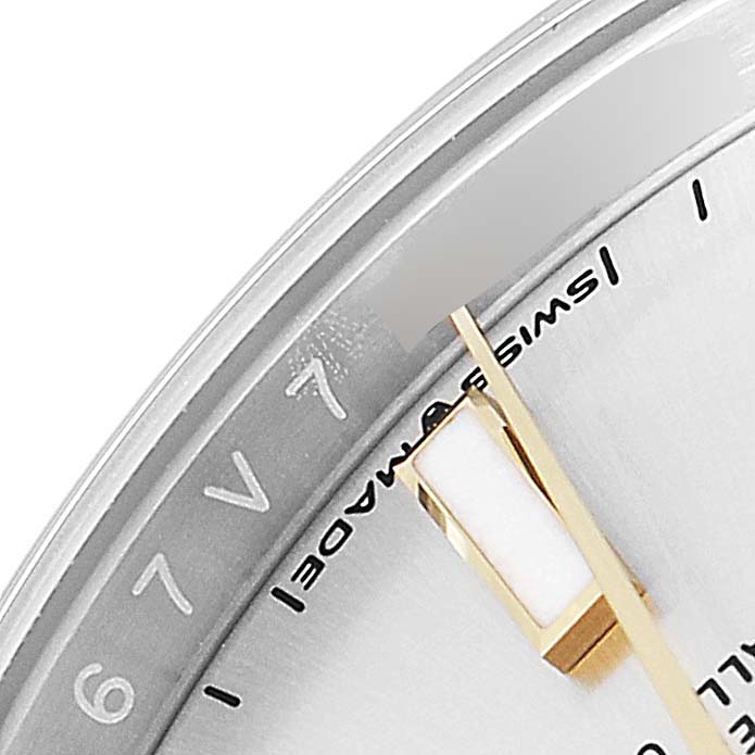 This is a close-up of the dial and hands of a Rolex Oyster Perpetual 124200 Men's Stainless Steel Silver Dial 124200 Men's Stainless Steel Silver Dial watch, showing the Swiss Made marking.