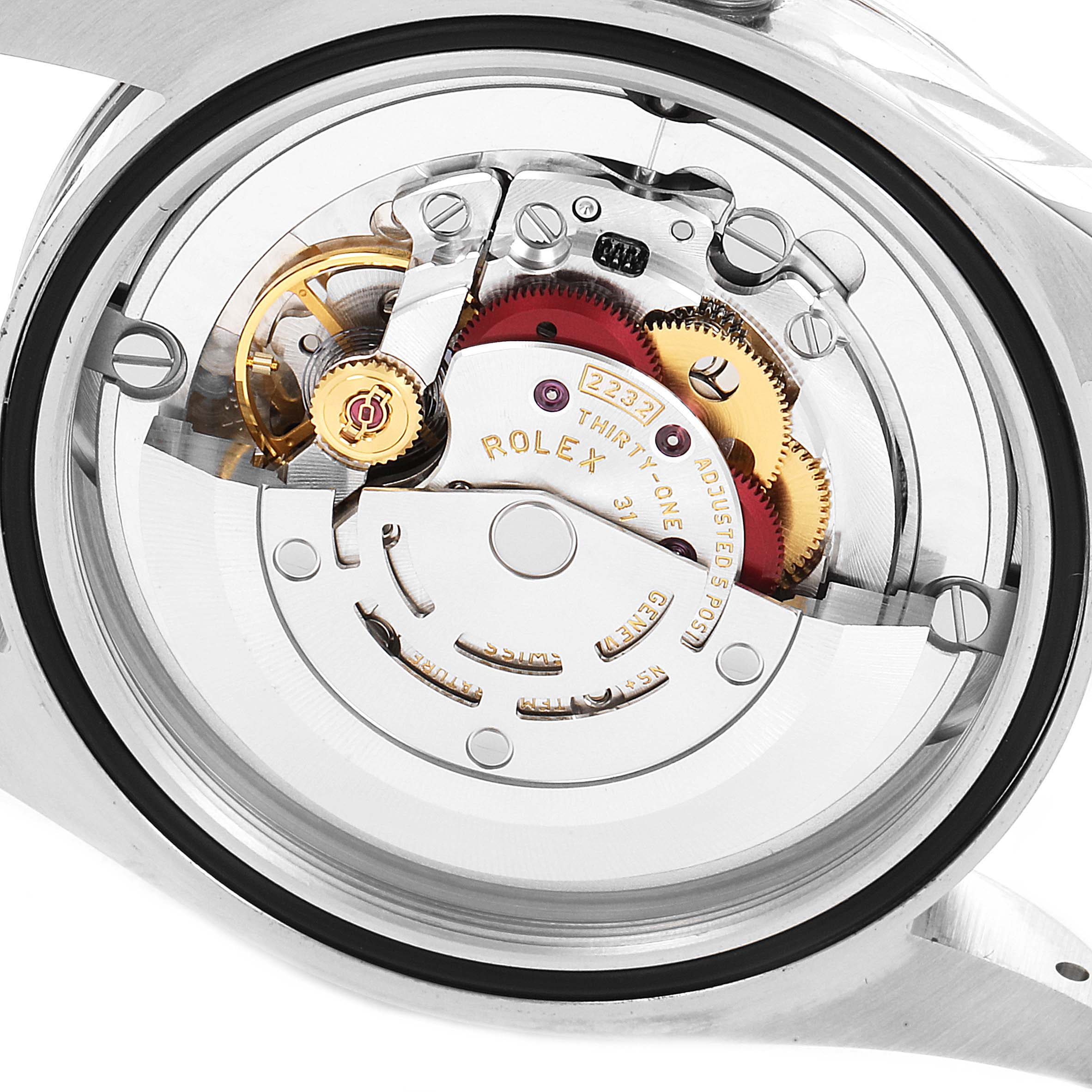 The image shows the internal mechanism of a Rolex Oyster Perpetual 124200 Men's Stainless Steel Silver Dial 124200 Men's Stainless Steel Silver Dial watch from a back view.