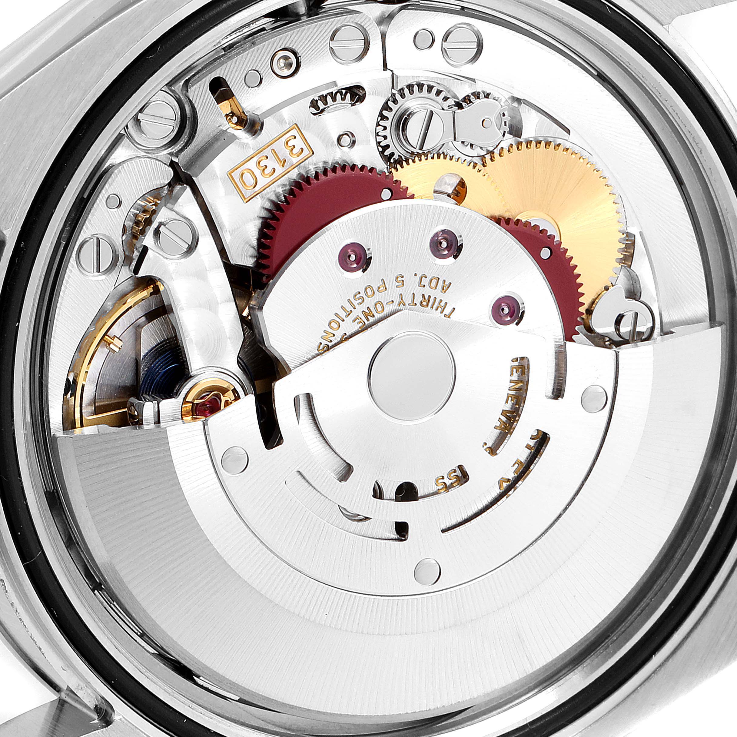 This image shows the inner mechanical components of a Rolex Oyster Perpetual 116000 Men's Stainless Steel Black Dial 116000 Men's Stainless Steel Black Dial watch, viewed from the back.