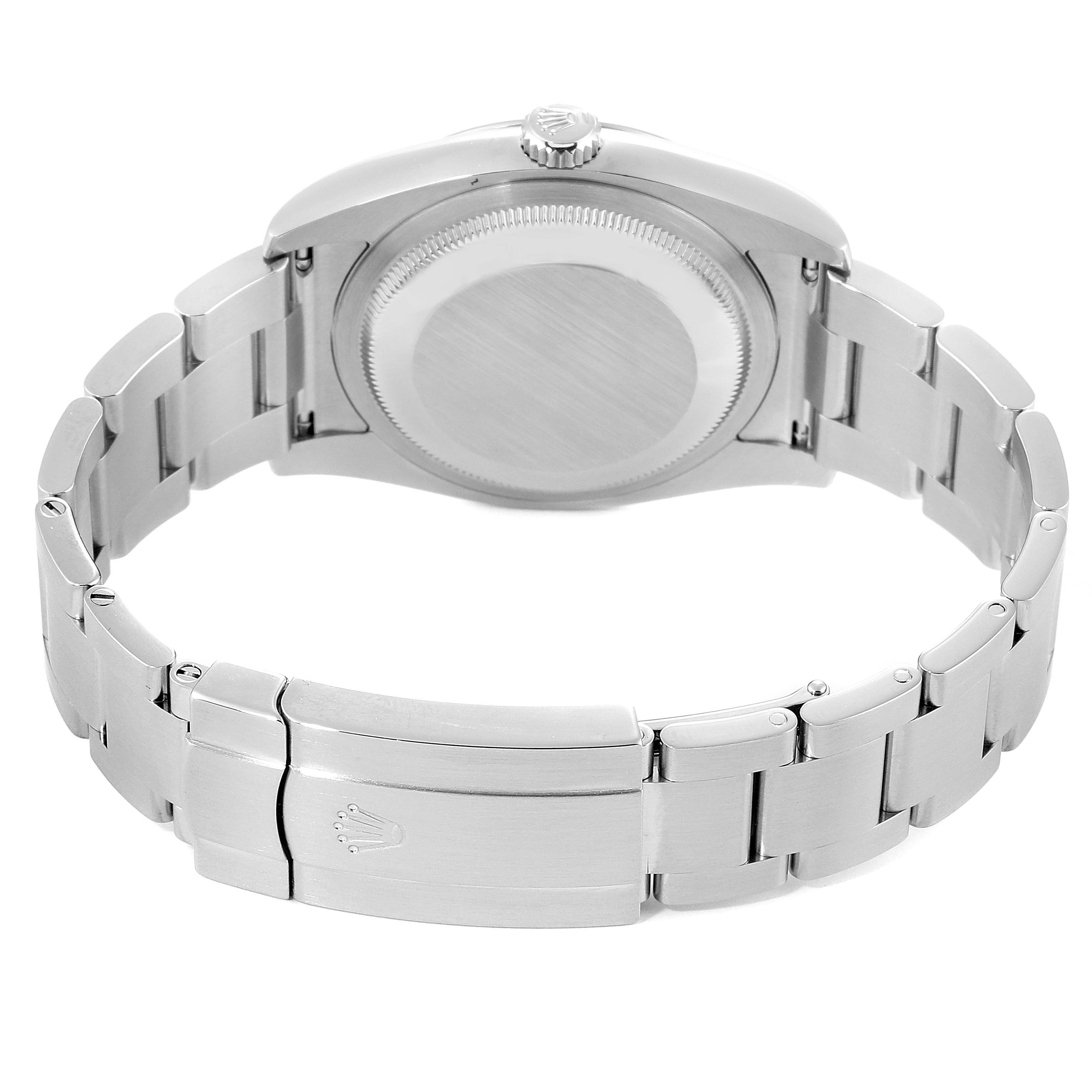 This image shows the back view of a Rolex Oyster Perpetual 116000 Men's Stainless Steel Black Dial 116000 Men's Stainless Steel Black Dial watch, highlighting the case back, the crown, and the bracelet with the clasp.