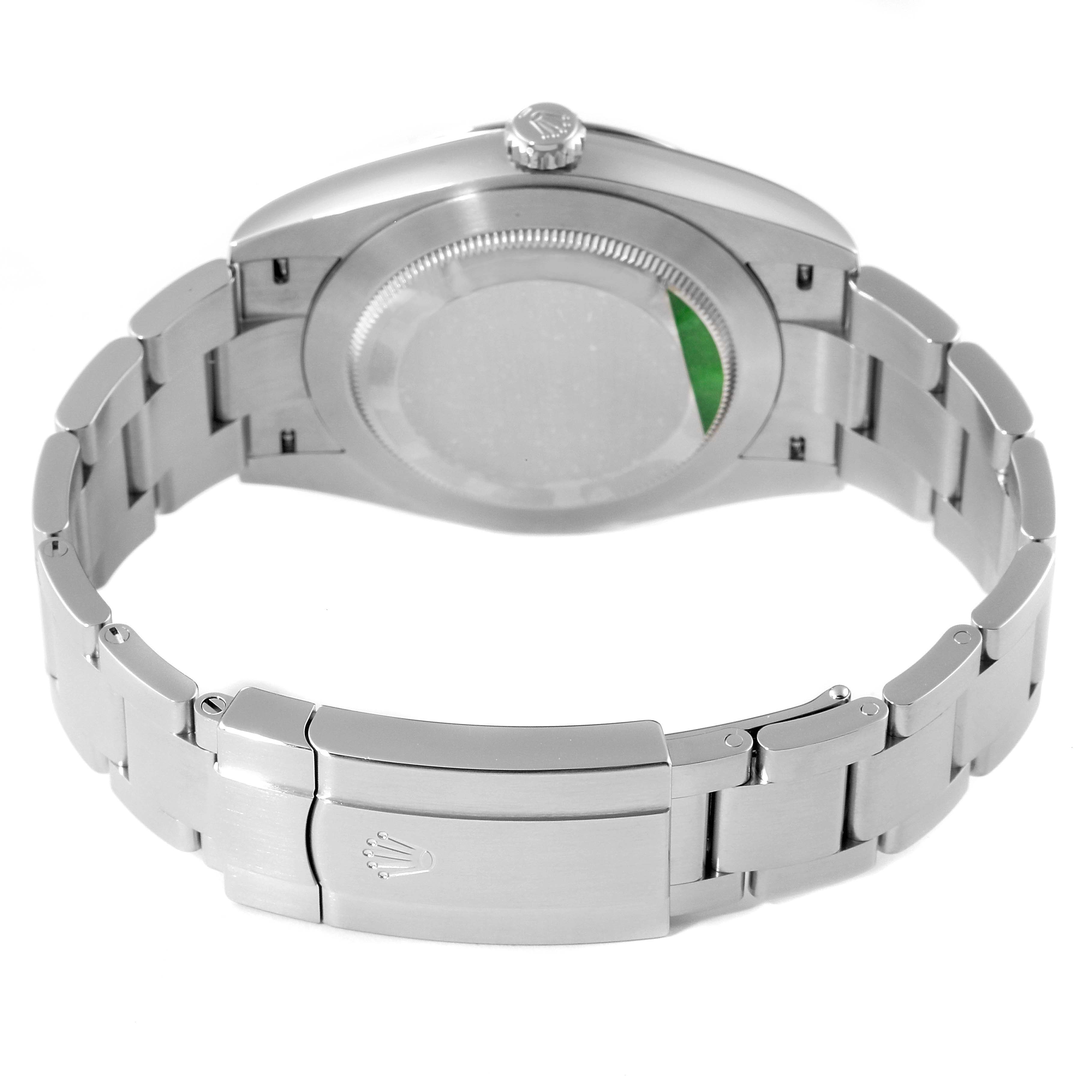 This image shows the back casing and stainless steel bracelet of the Rolex Oyster Perpetual 124300 Men's Stainless Steel Black Dial 124300 Men's Stainless Steel Black Dial watch from a rear angle.