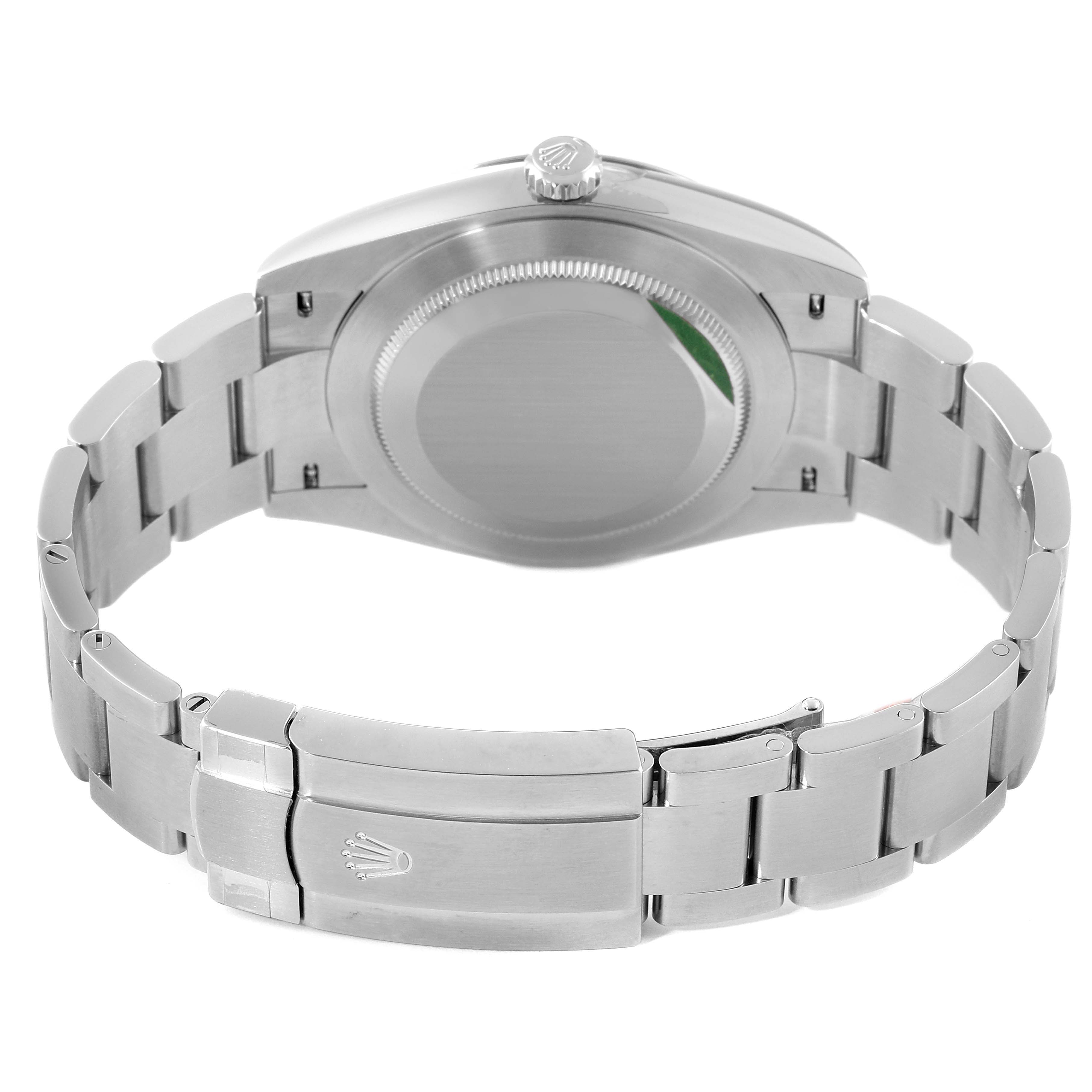 The image shows the back view of a Rolex Oyster Perpetual 124300 Men's Stainless Steel Green Dial 124300 Men's Stainless Steel Green Dial watch, highlighting its case back, crown, and bracelet with the clasp.