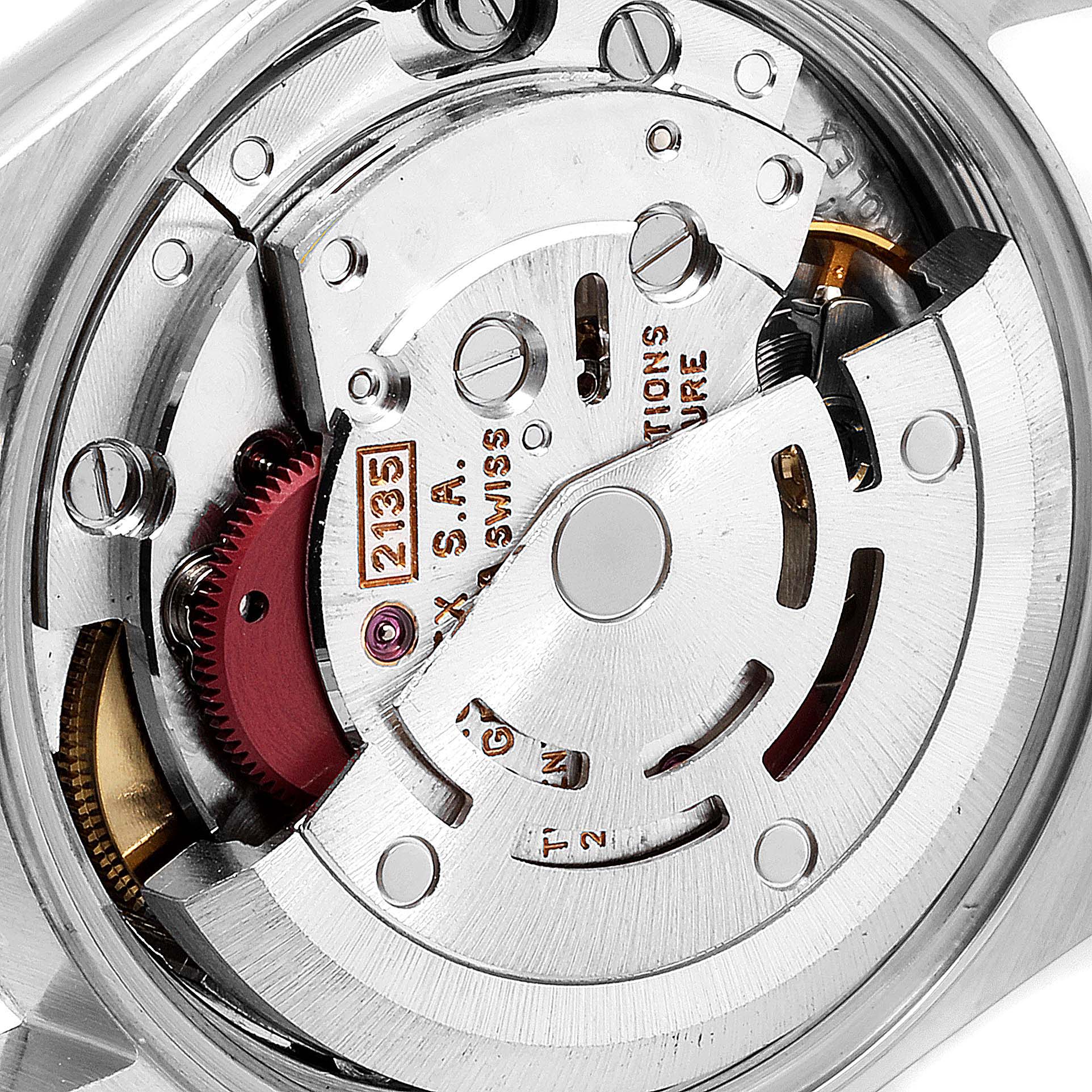 This close-up image shows the movement mechanism of the Rolex Oyster Perpetual 67193 Women
s Steel and Gold (two tone) Black Dial 67193 Women
s Steel and Gold (two tone) Black Dial model.