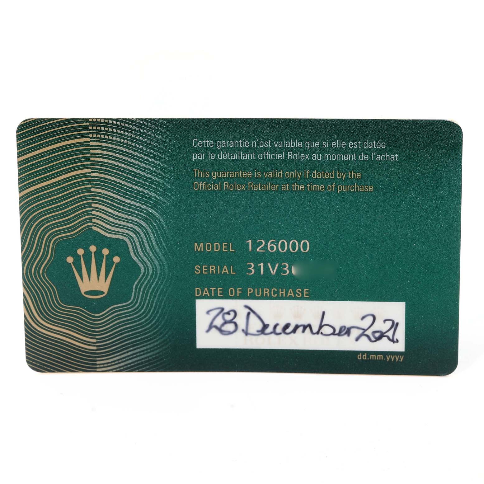 The image shows a guarantee card for the Rolex Oyster Perpetual 126000 Men's Stainless Steel Green Dial 126000 Men's Stainless Steel Green Dial model 126000, featuring the model and serial numbers.