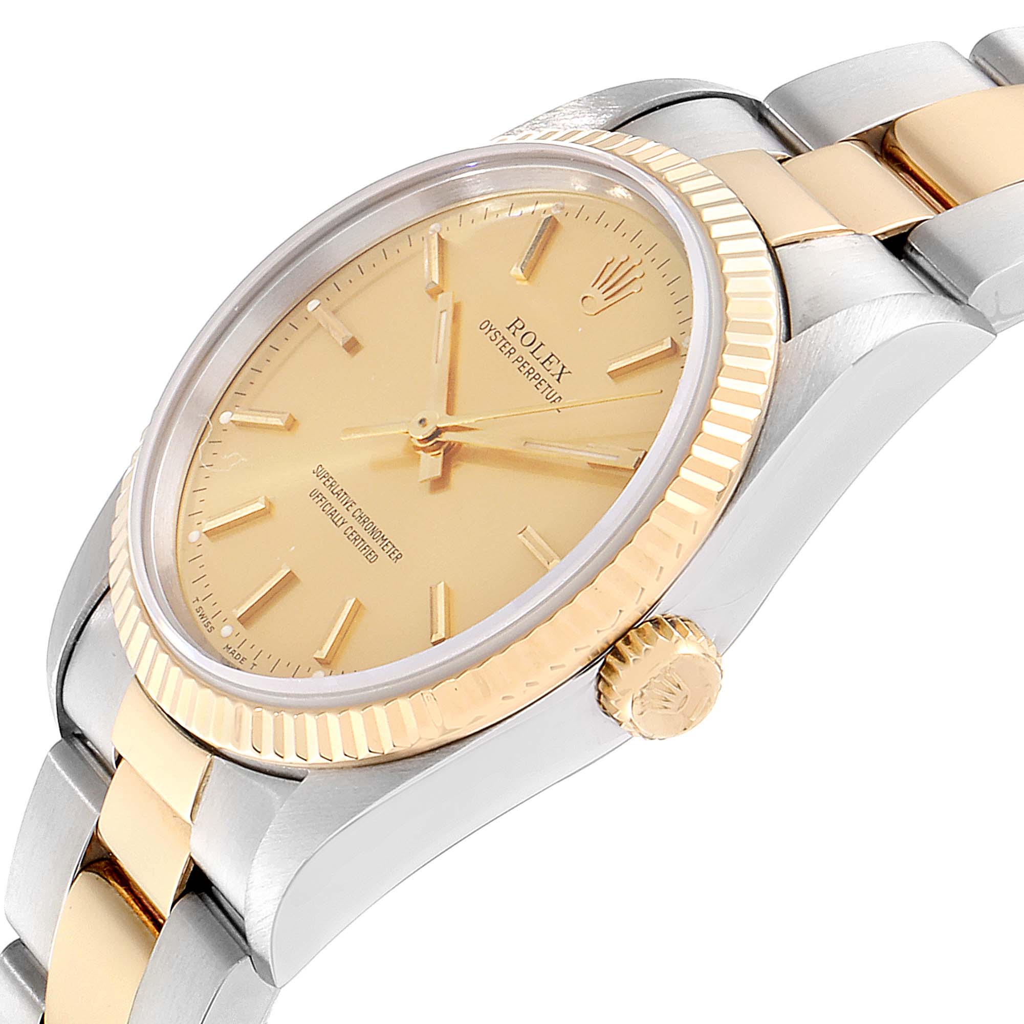 This image shows a Rolex Oyster Perpetual 14233 Men's Steel and Gold (two tone) Champagne Dial 14233 Men's Steel and Gold (two tone) Champagne Dial watch at an angle highlighting its gold dial, fluted bezel, and two-tone bracelet.