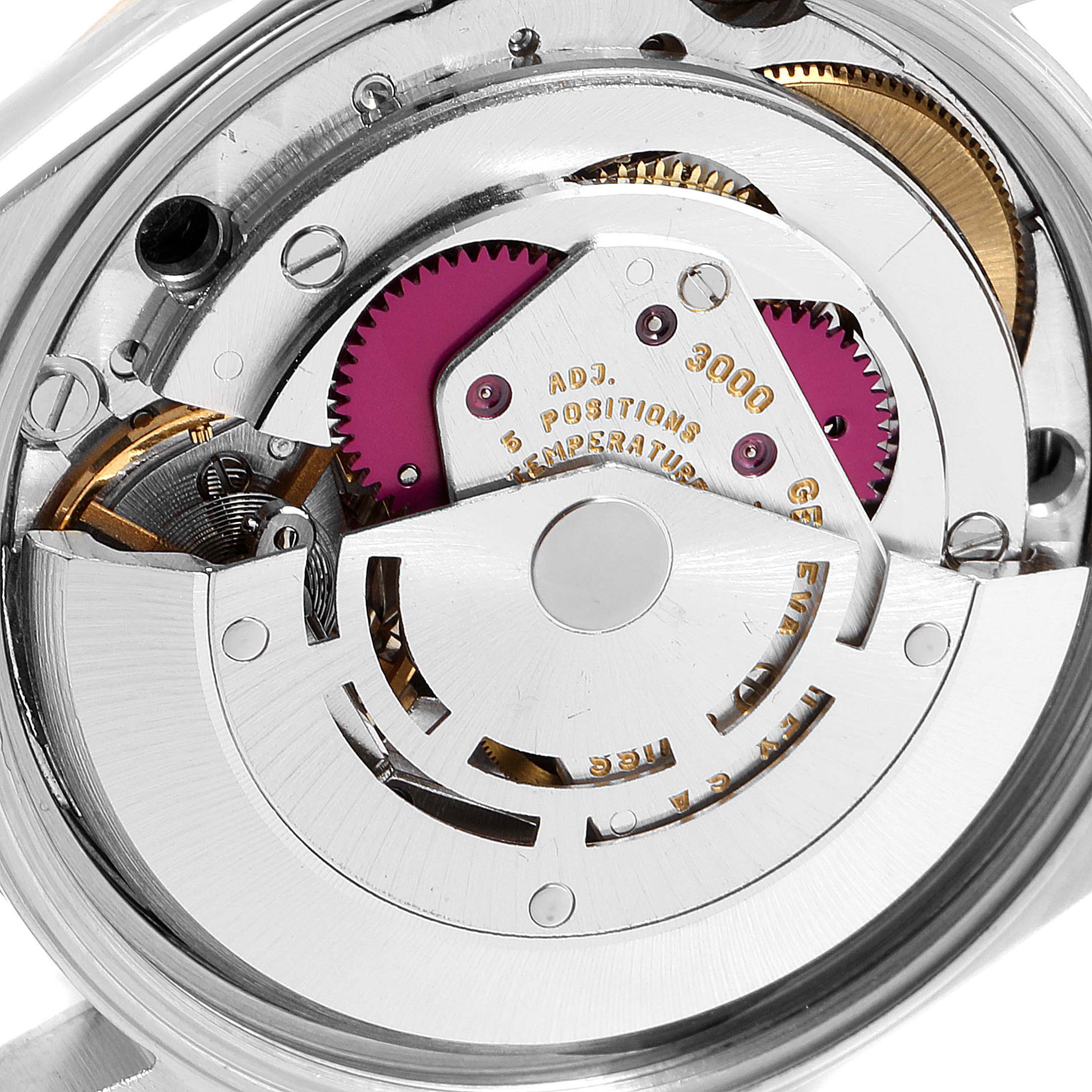 This image shows the internal mechanism and movement parts of a Rolex Oyster Perpetual 14233 Men's Steel and Gold (two tone) Champagne Dial 14233 Men's Steel and Gold (two tone) Champagne Dial watch.