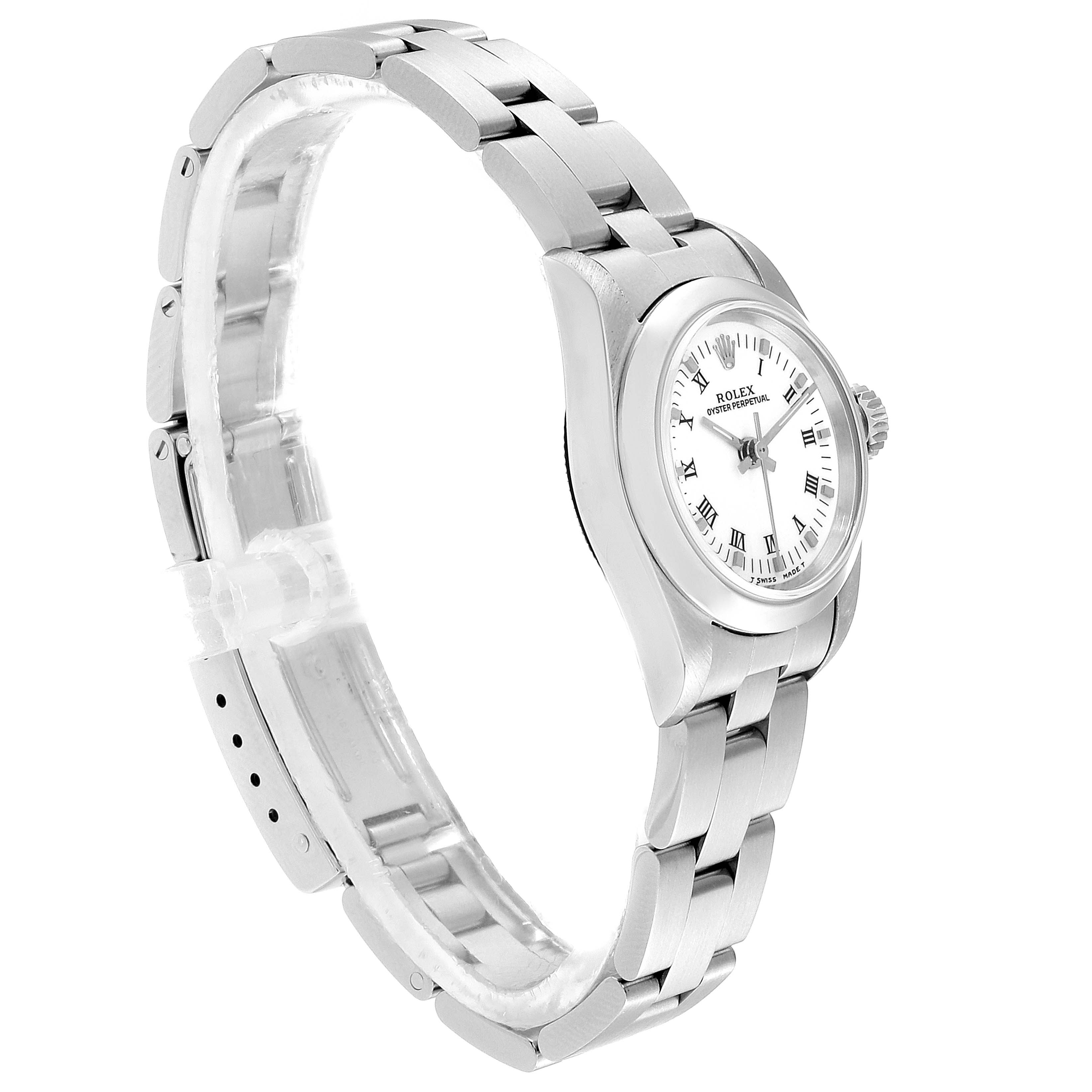 This image shows a Rolex Oyster Perpetual 67180 Women's Stainless Steel White Dial 67180 Women's Stainless Steel White Dial watch from a side angle, highlighting its bracelet, case, and crown.