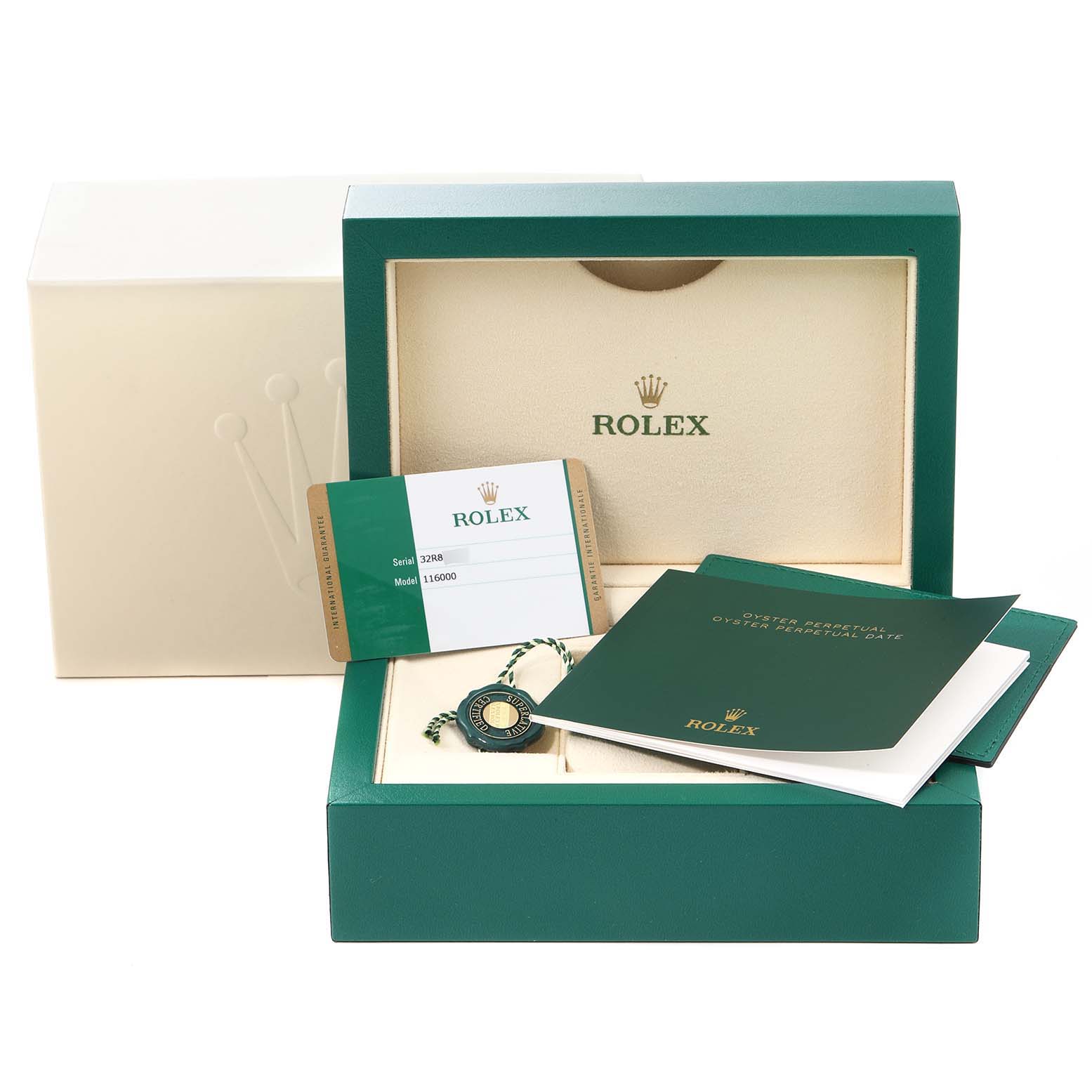 The image shows packaging and accessories for a Rolex Oyster Perpetual 116000 Men's Stainless Steel Grey Dial 116000 Men's Stainless Steel Grey Dial watch, including the box, warranty card, booklet, and tag.