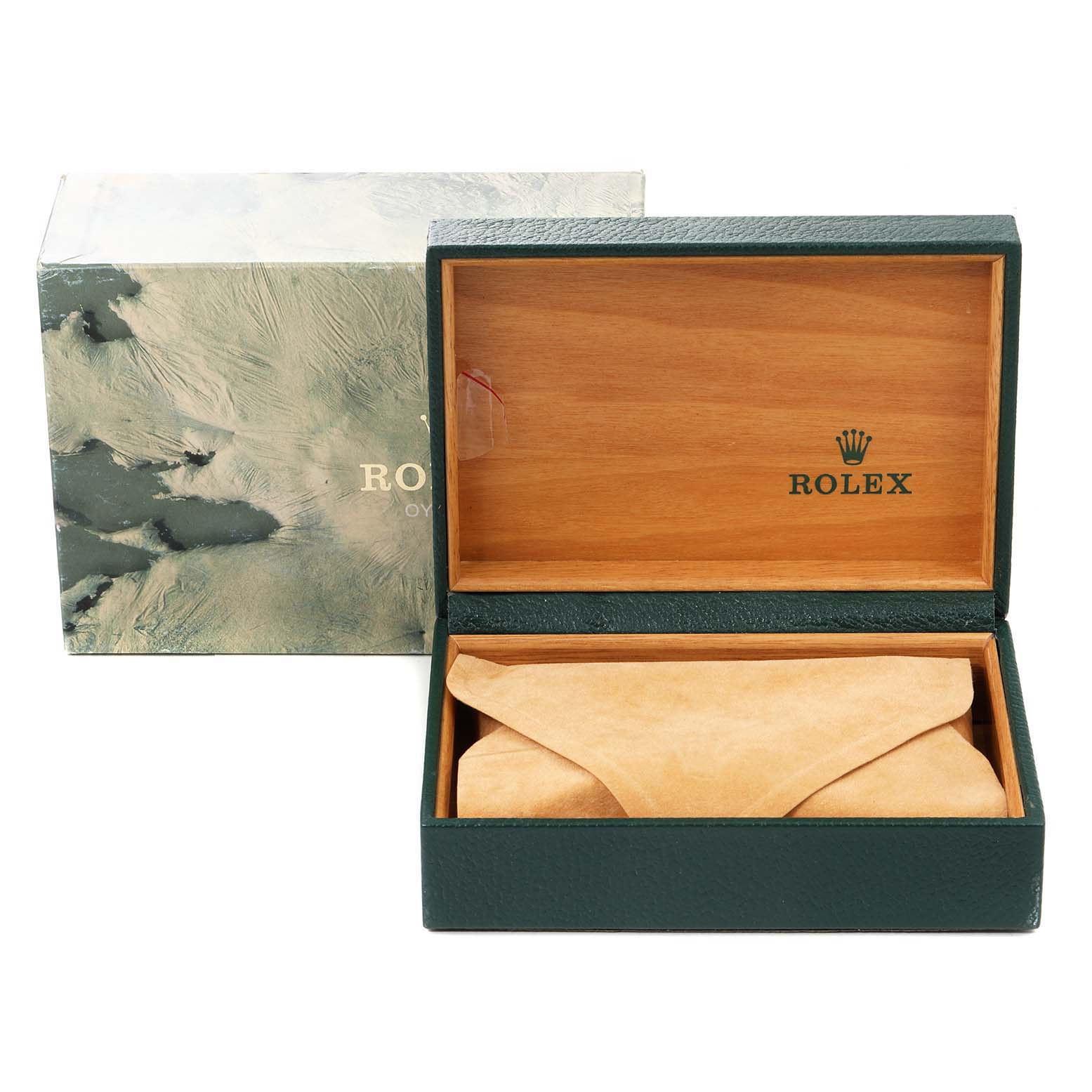The image shows an open green Rolex watch box for the Oysterquartz model with a beige pouch inside and the outer packaging beside it.