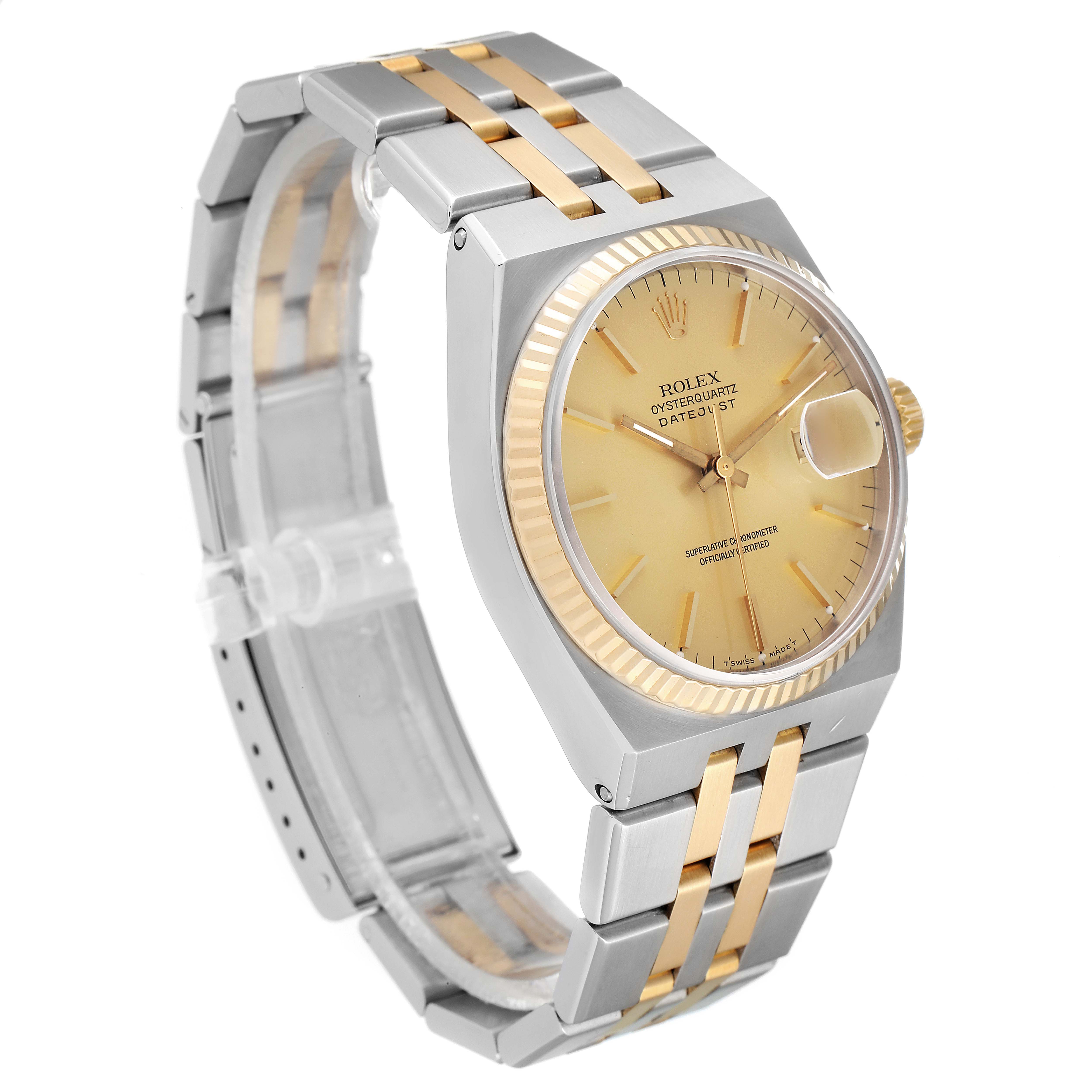 This Rolex Oysterquartz 17013 Men's Steel and Gold (two tone) Champagne Dial 17013 Men's Steel and Gold (two tone) Champagne Dial watch is shown at an angle displaying its face, bezel, and two-tone bracelet.