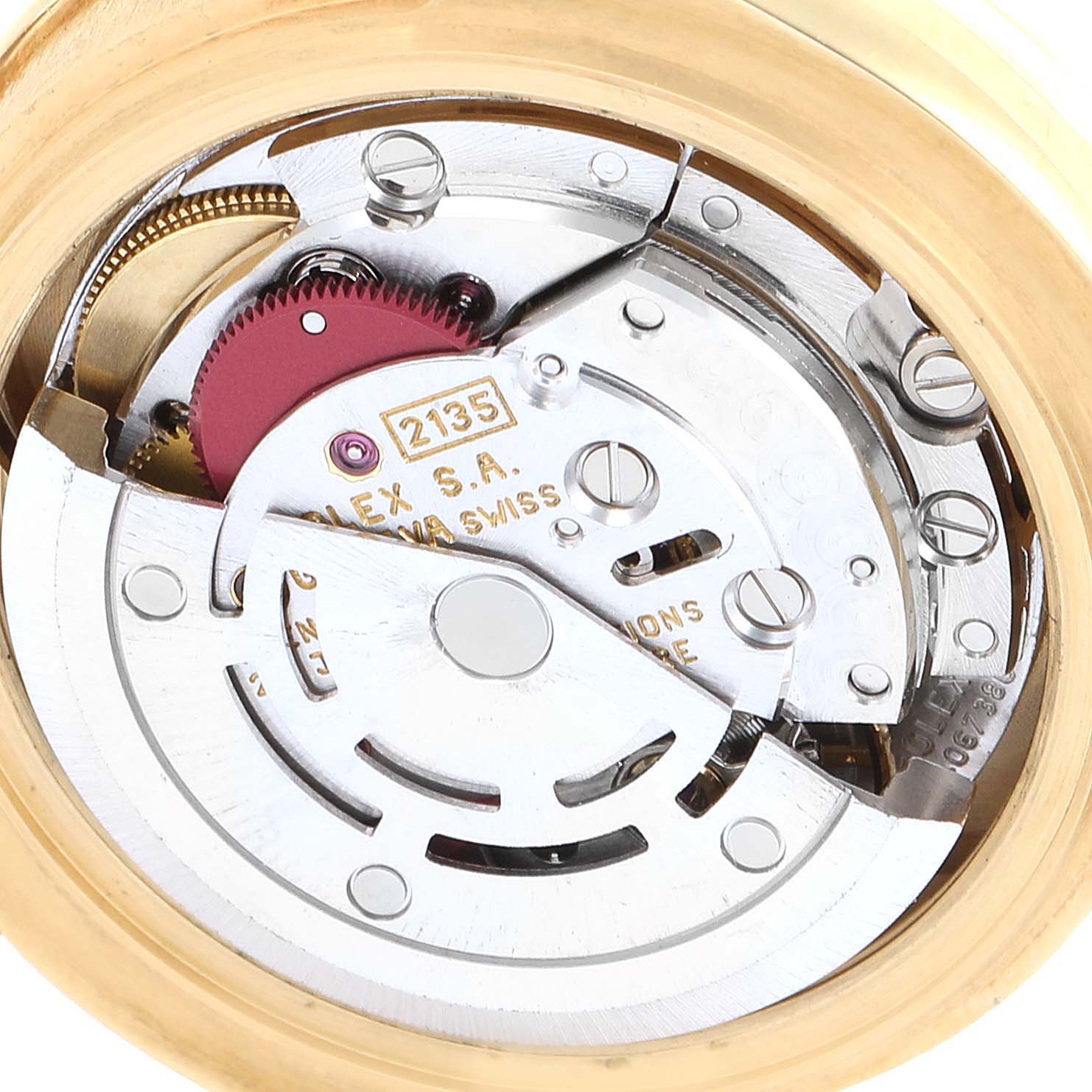 This is the internal mechanism, or movement, of the Rolex Pearlmaster 69298 Women's Yellow Gold Champagne Dial 69298 Women's Yellow Gold Champagne Dial watch, viewed from the back.