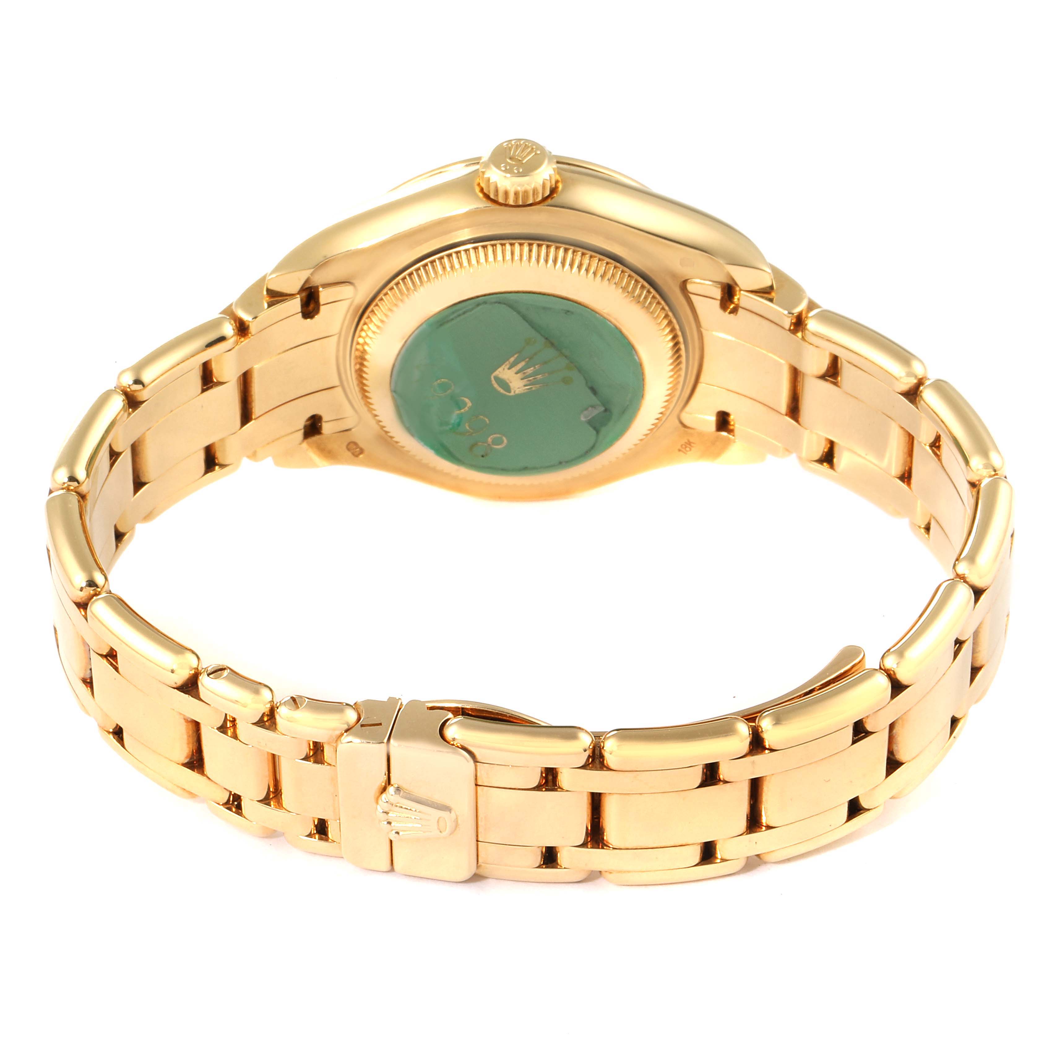 The image shows the back and clasp of a Rolex Pearlmaster 69298 Women's Yellow Gold Champagne Dial 69298 Women's Yellow Gold Champagne Dial watch, highlighting its gold bracelet and crown logo on the clasp.