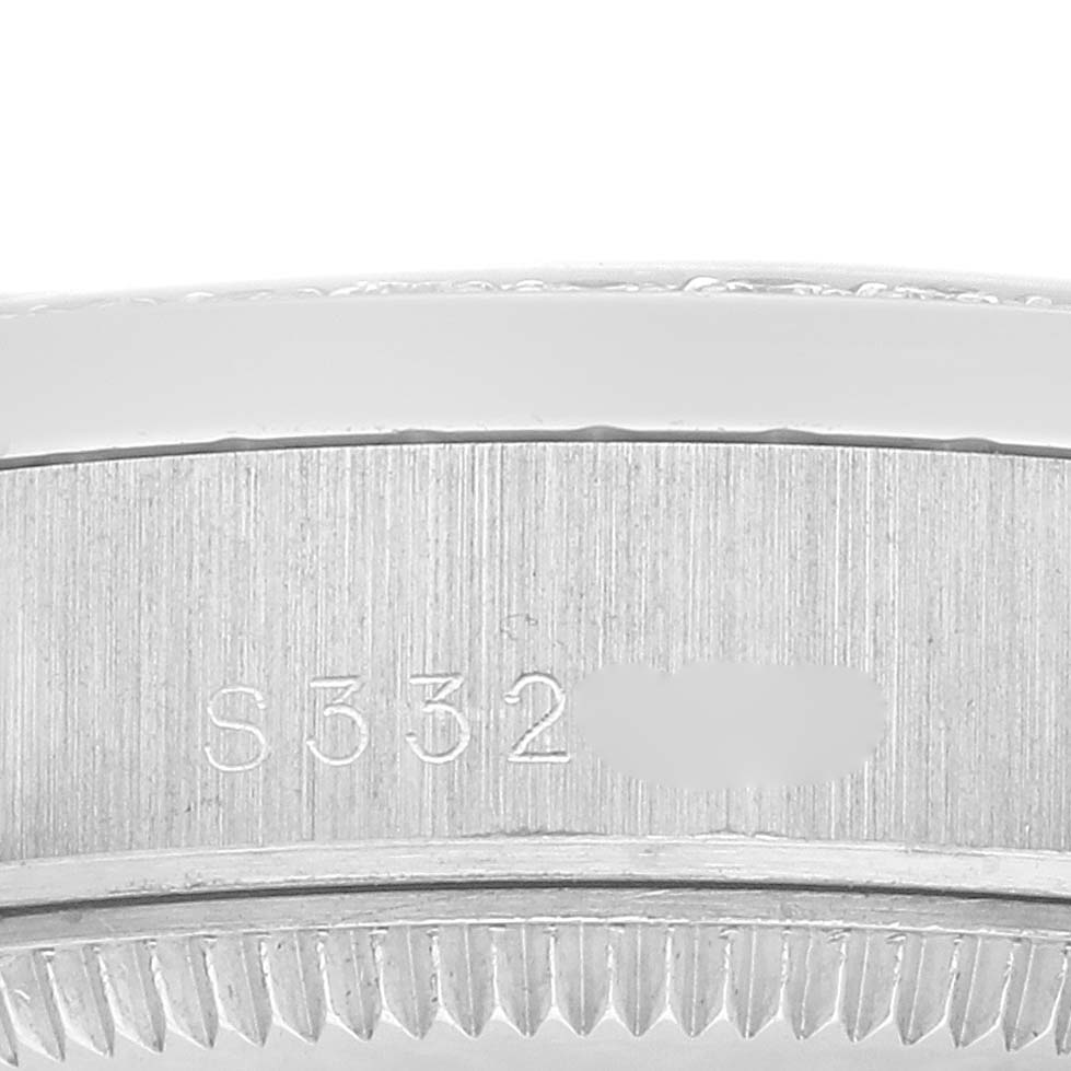 The image shows a close-up of the side of a Rolex President 68286 Women's Platinum Silver Dial watch, highlighting the serial engraving.
