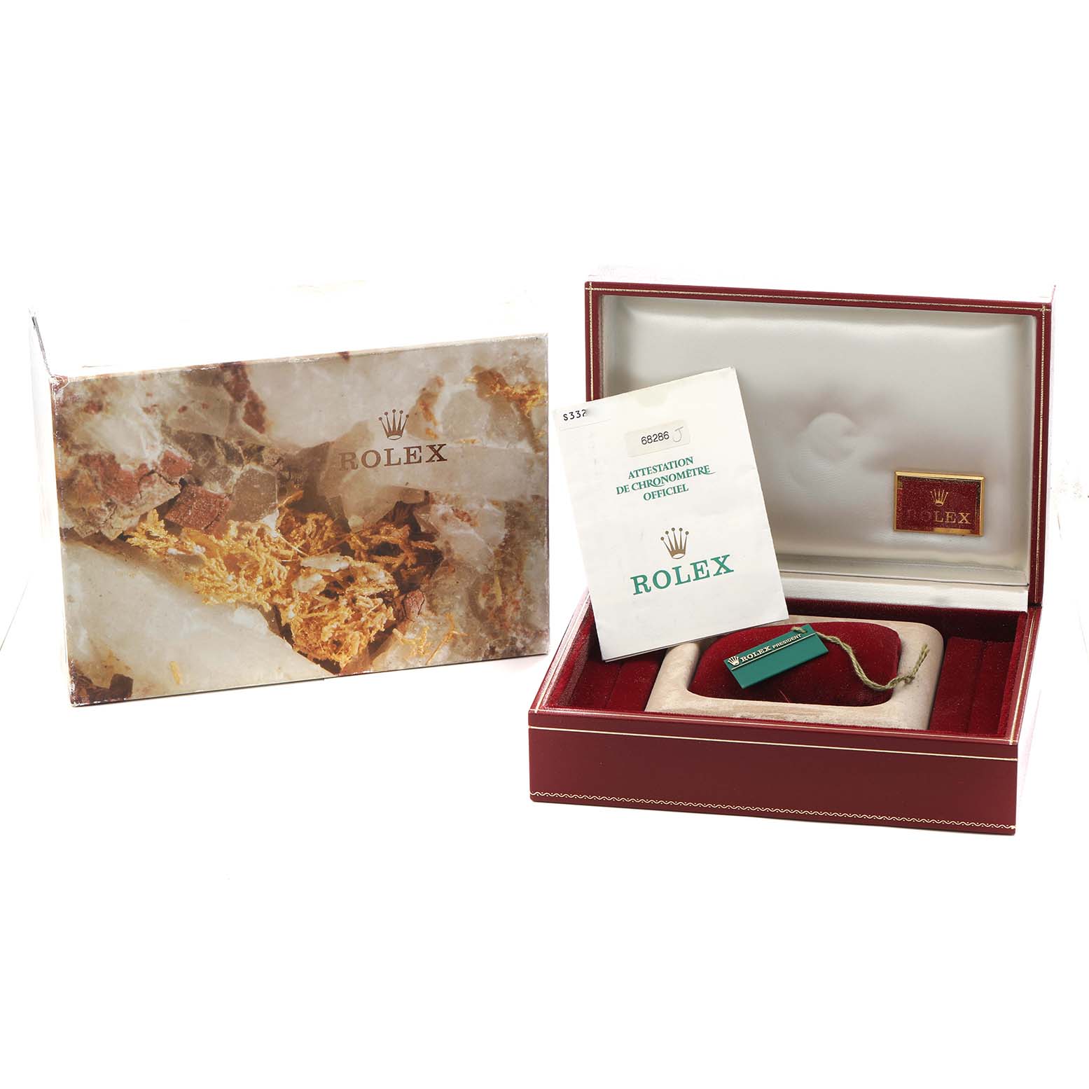 The image shows a Rolex President 68286 Women's Platinum Silver Dial watch's accessories, including a box, booklet, and tags, viewed from the top.