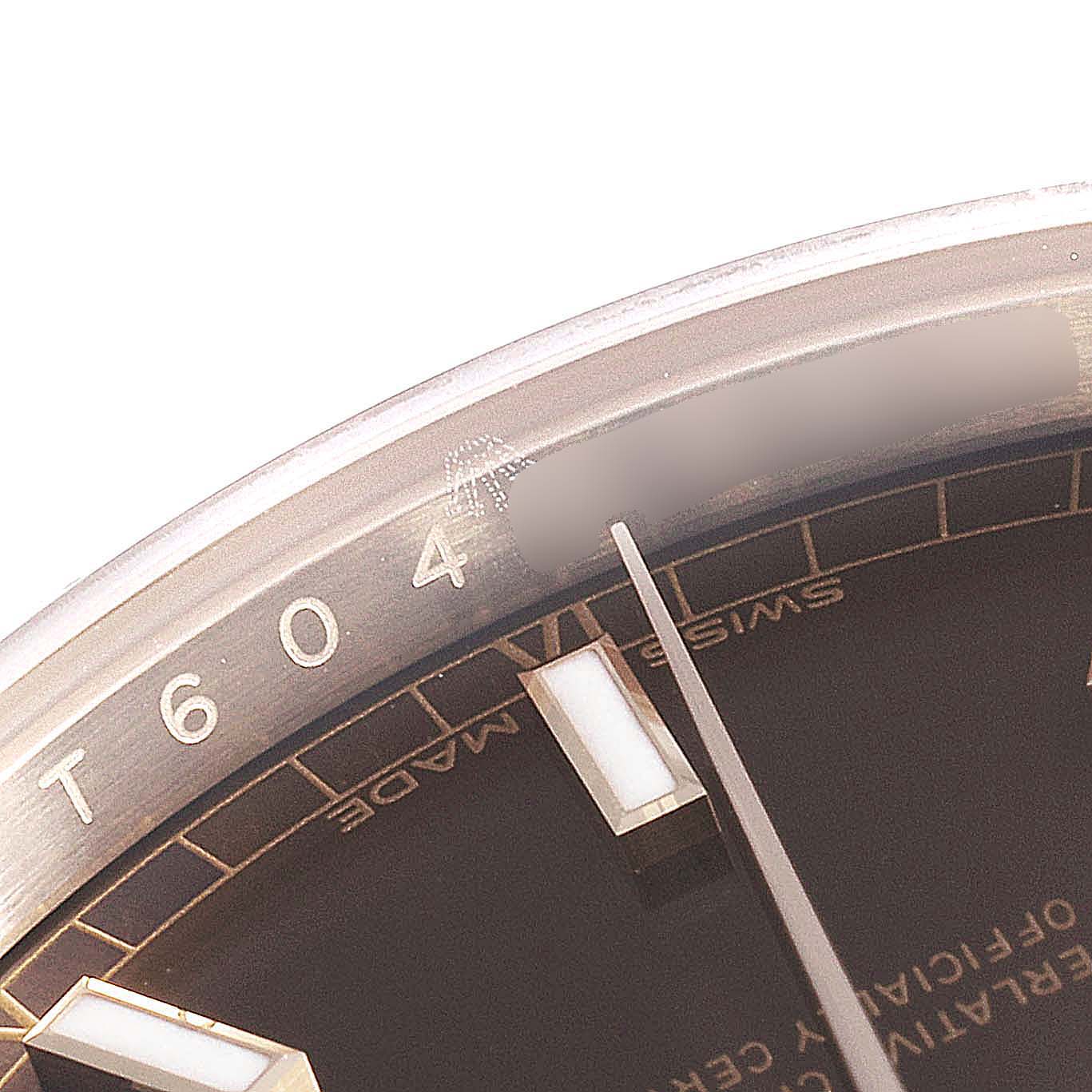 This close-up angle shows part of the dial and hour markers of the Rolex President 118135 Men's Rose Gold Brown Dial 118135 Men's Rose Gold Brown Dial model watch.