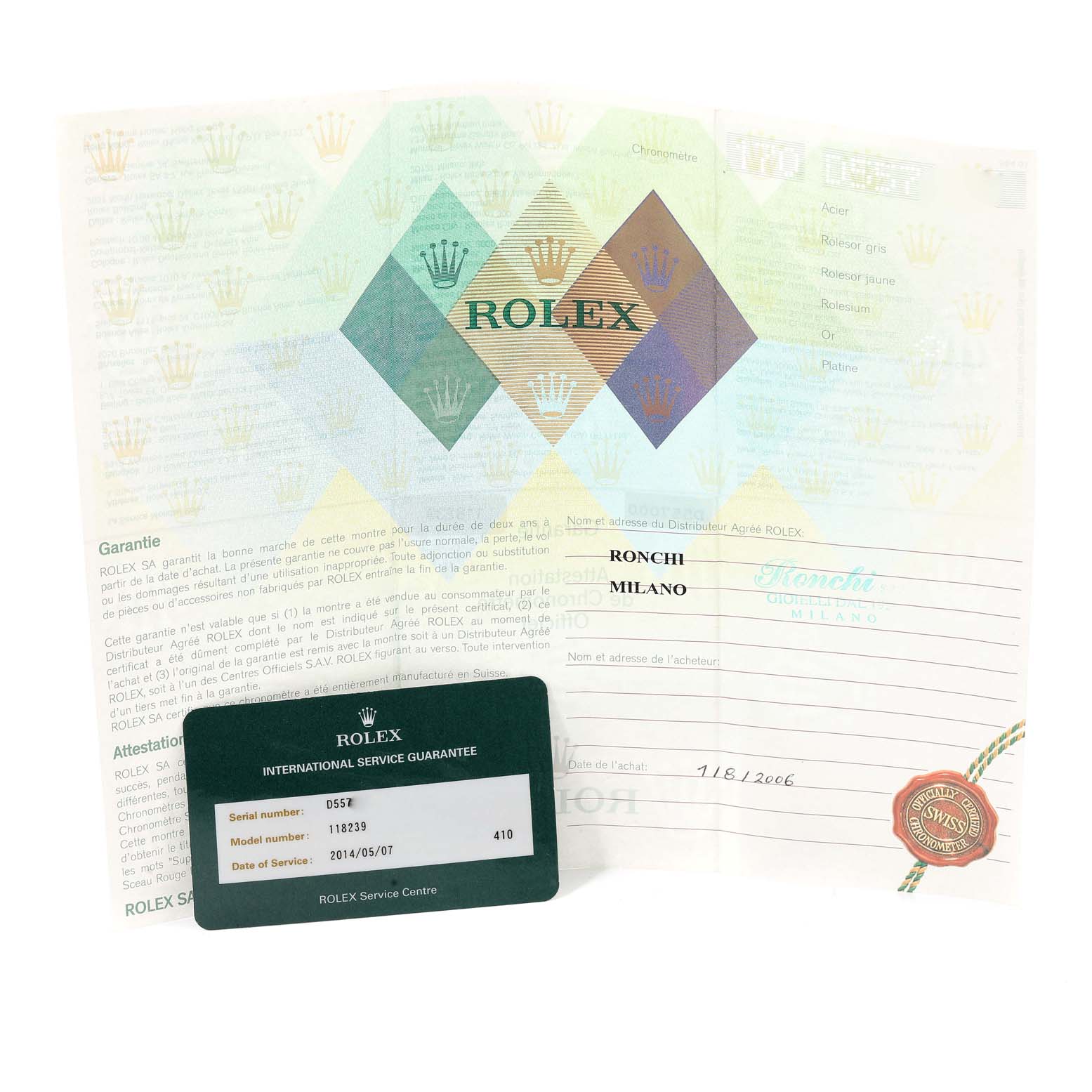 This image shows the certification and an international service guarantee card for the Rolex President 118239 Men's White Gold Silver Dial 118239 Men's White Gold Silver Dial model watch.