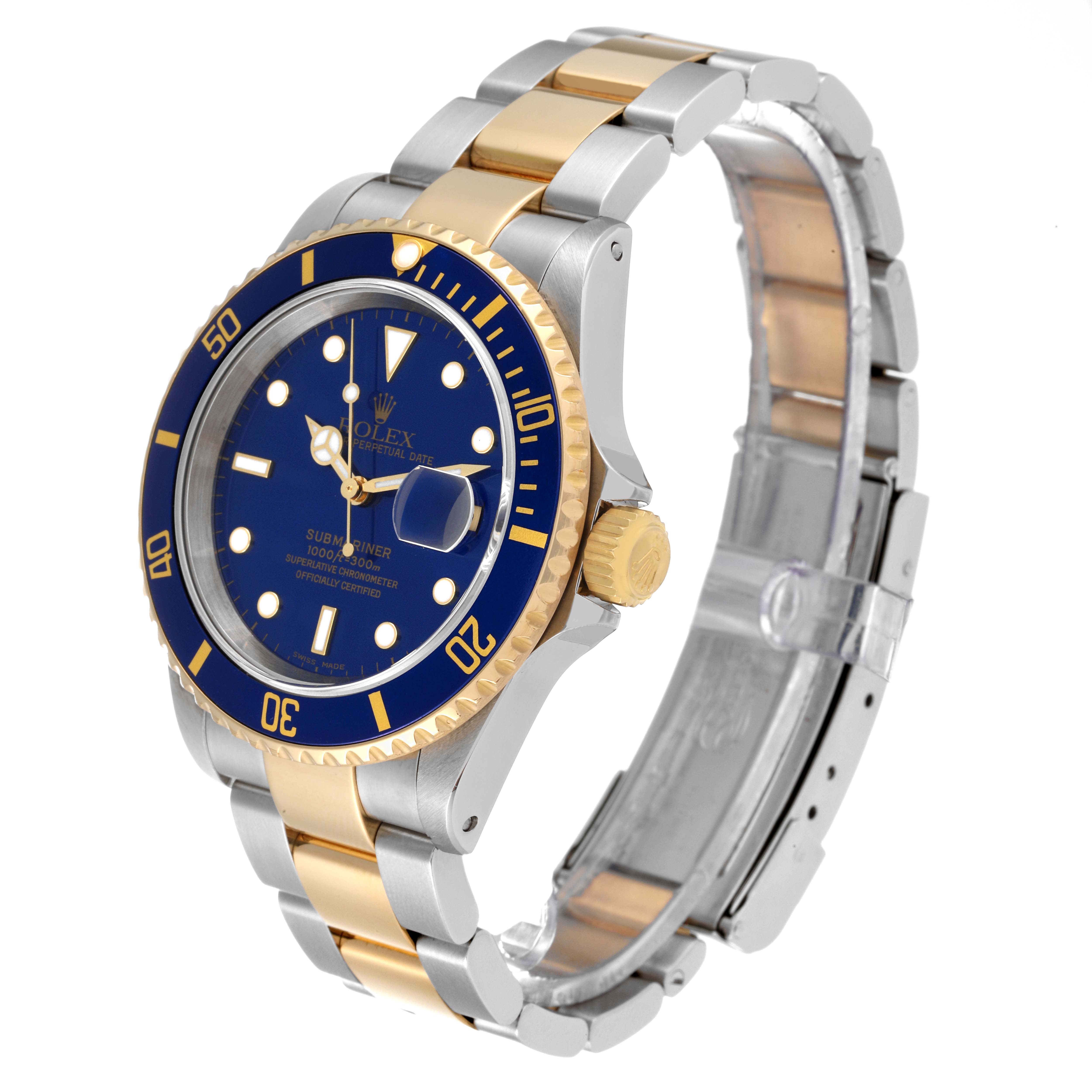 This image shows a Rolex Submariner 16613 Men's Steel and Gold (two tone) Blue Dial 16613 Men's Steel and Gold (two tone) Blue Dial watch at an angle that highlights its blue dial, gold bezel, and two-tone bracelet.