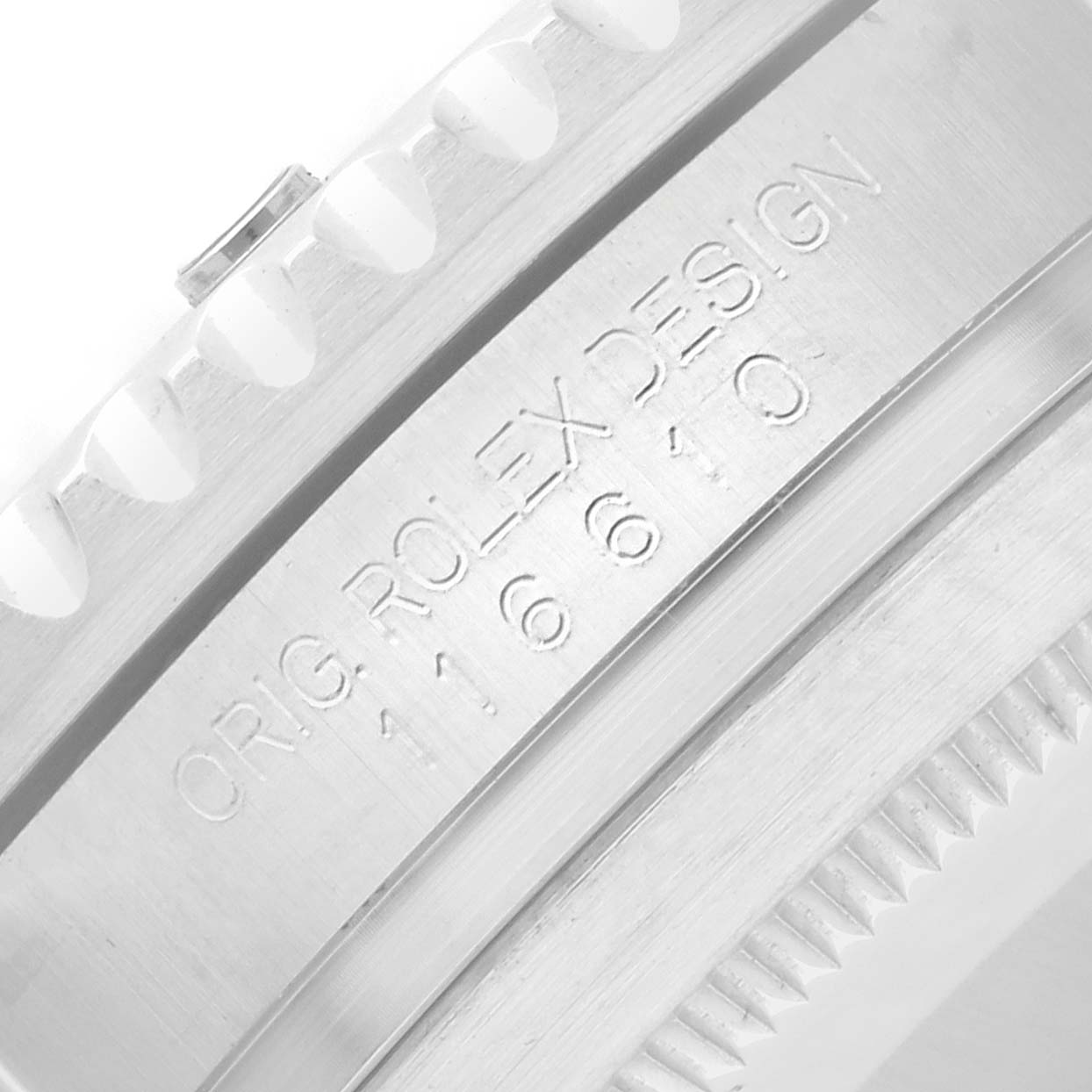 The image shows a close-up of the bezel and engraving detailing on the Rolex Submariner 116610 Men's Stainless Steel Black Dial watch.