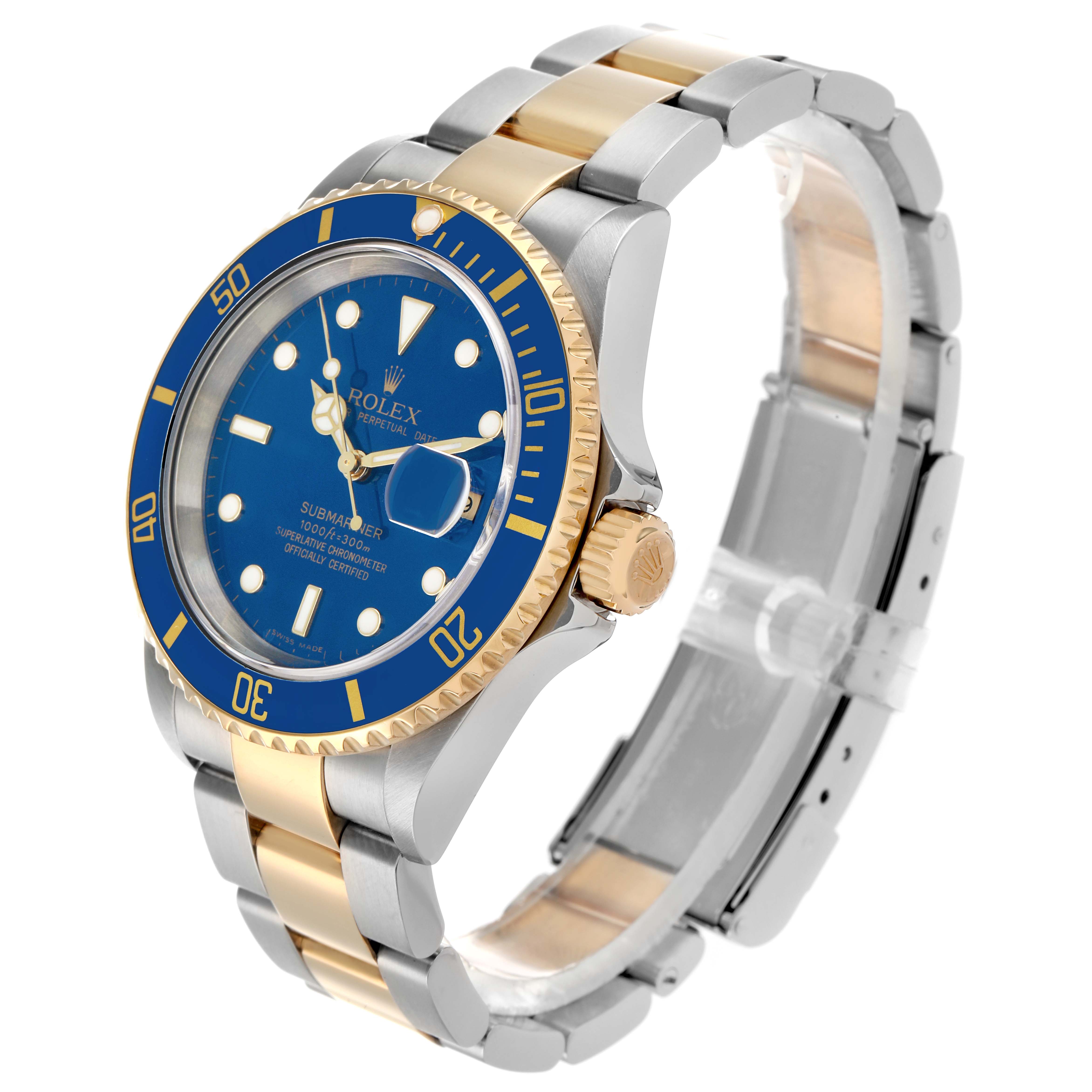 The Rolex Submariner 16613 Men's Steel and Gold (two tone) Blue Dial watch is shown at an angled view highlighting the dial, bezel, bracelet, and crown.