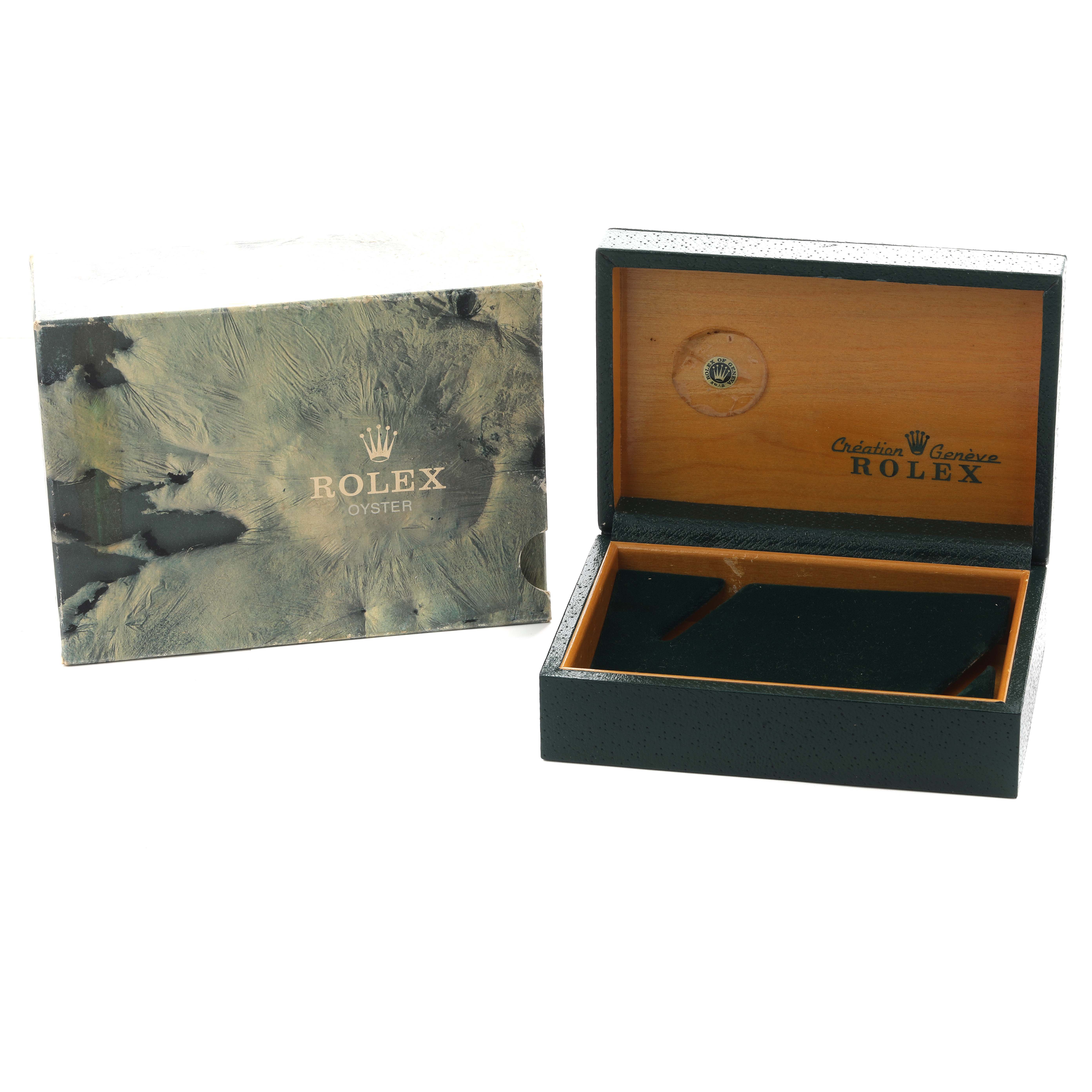 The image shows an open Rolex Submariner 16613 Men's Steel and Gold (two tone) Champagne Dial wooden box, lid up, alongside a closed textured outer box.