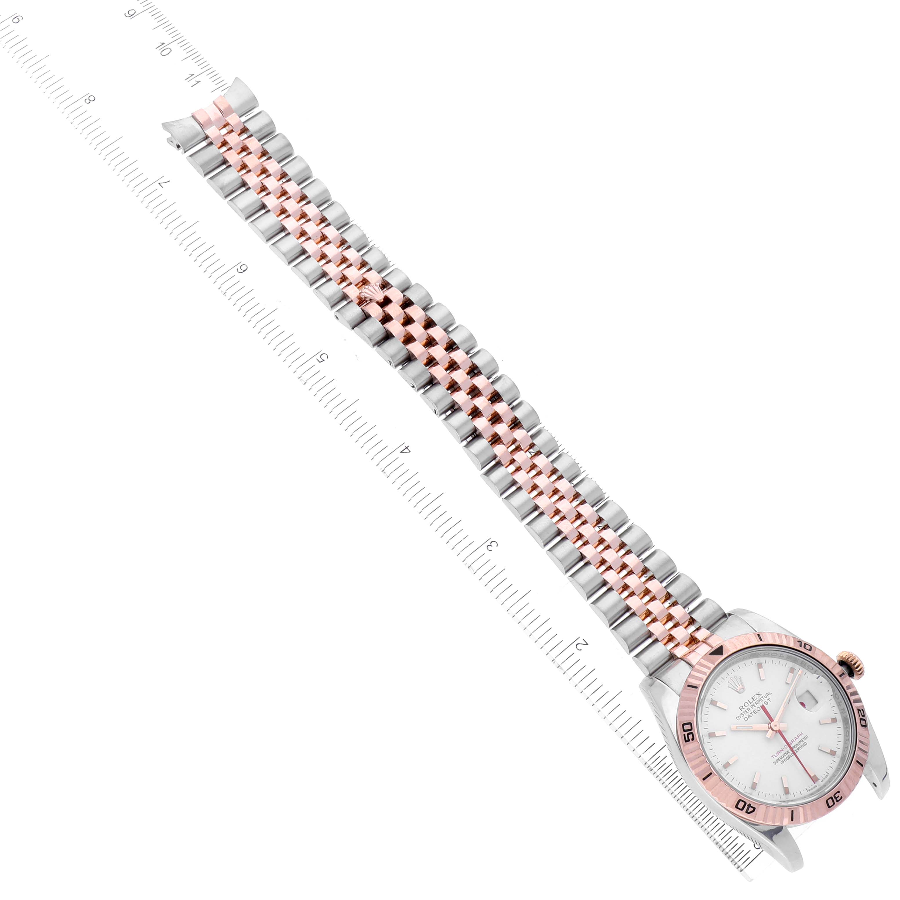 The image shows a Rolex Turn-o-Graph 116261 Men
s Steel and Gold (two tone) White Dial 116261 Men
s Steel and Gold (two tone) White Dial watch laid flat, displaying the dial, bezel, and two-tone bracelet.