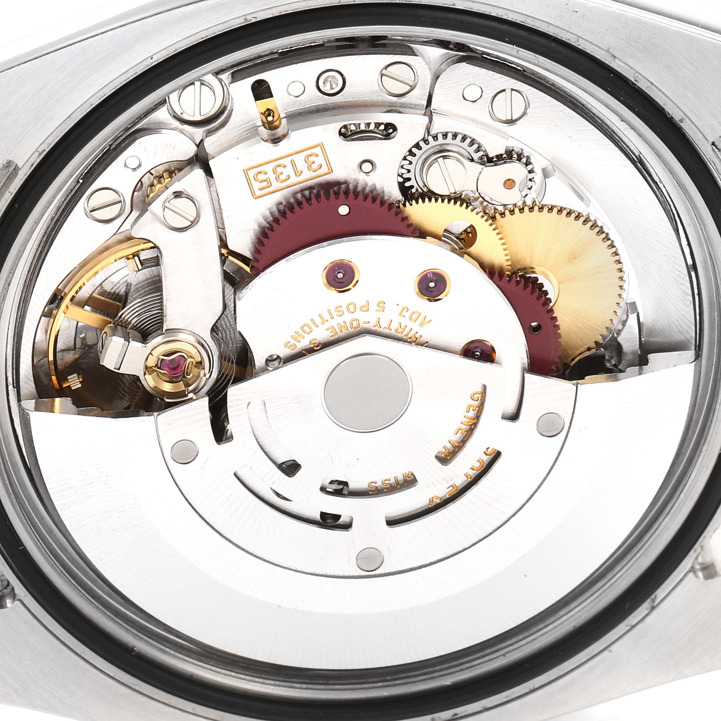 The image shows the internal mechanical movement of a Rolex Turn-o-Graph 116261 Men's Steel and Gold (two tone) Silver Dial 116261 Men's Steel and Gold (two tone) Silver Dial model from a rear angle.